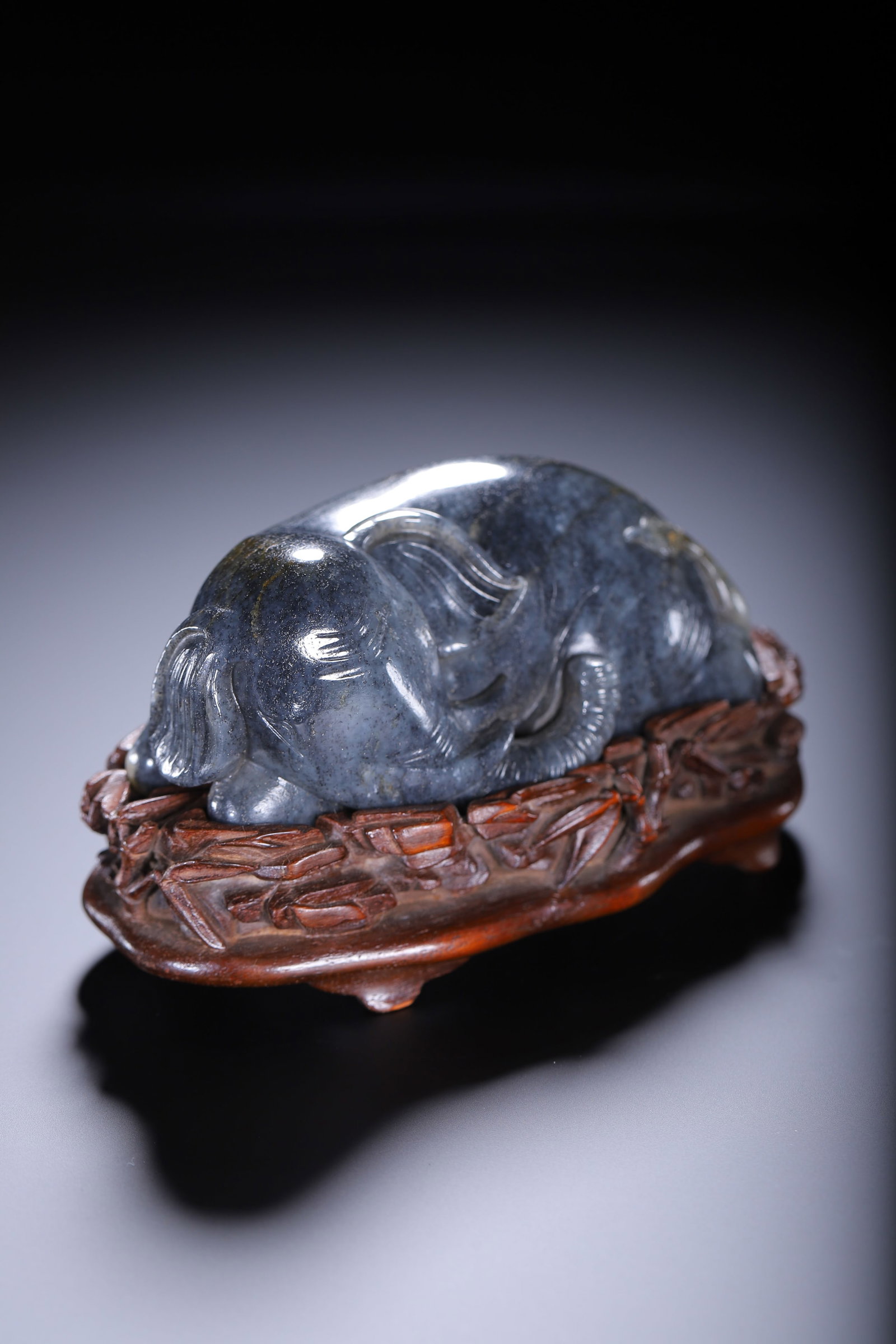 A CARVED JADE ELEPHANT - 4