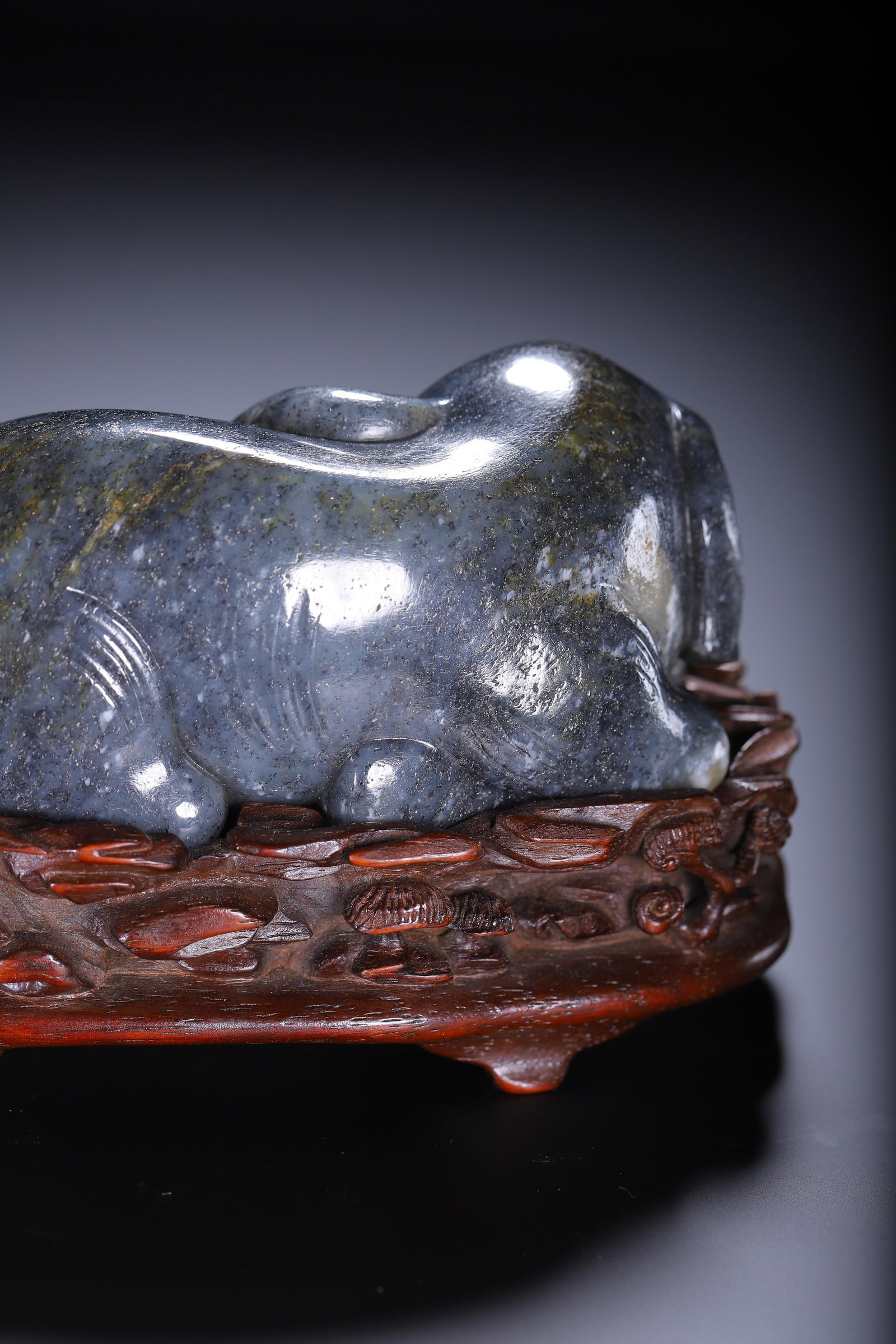 A CARVED JADE ELEPHANT - 6