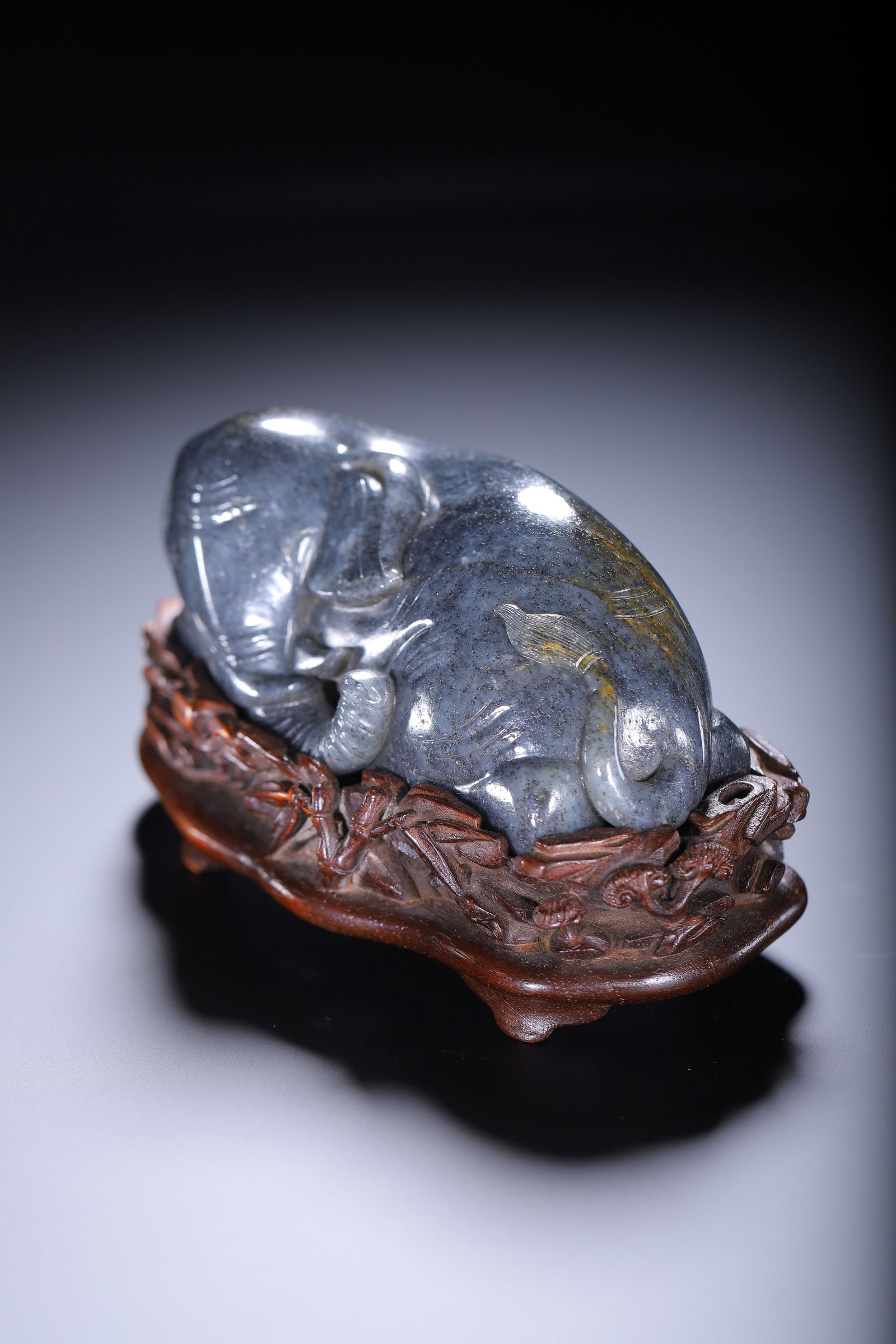 A CARVED JADE ELEPHANT - 8