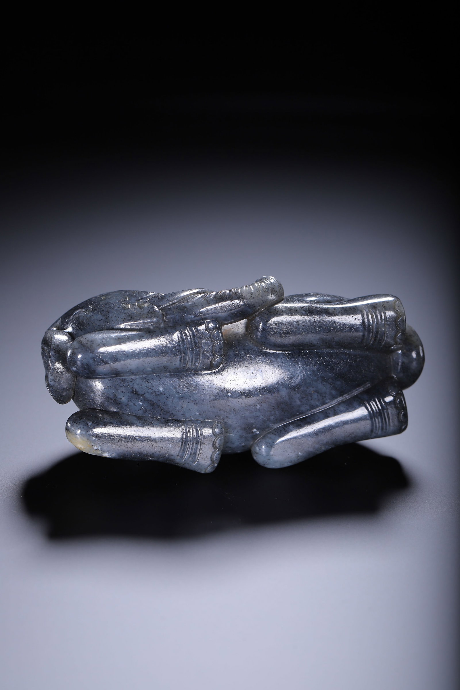 A CARVED JADE ELEPHANT - 9