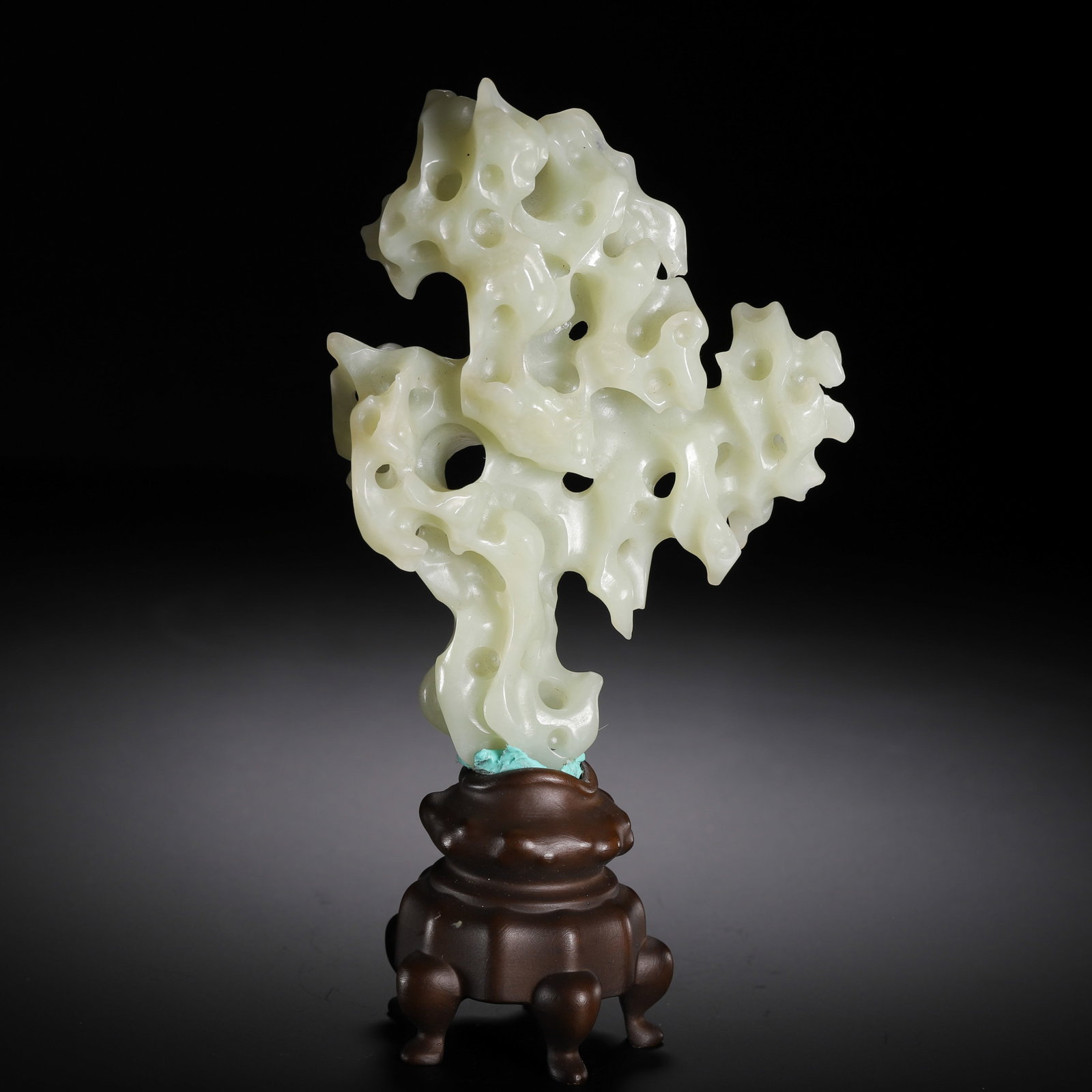 A CARVED WHITE JADE LITERATI ROCK: A CARVED WHITE JADE LITERATI ROCK (19cm,Weight 270 grams)