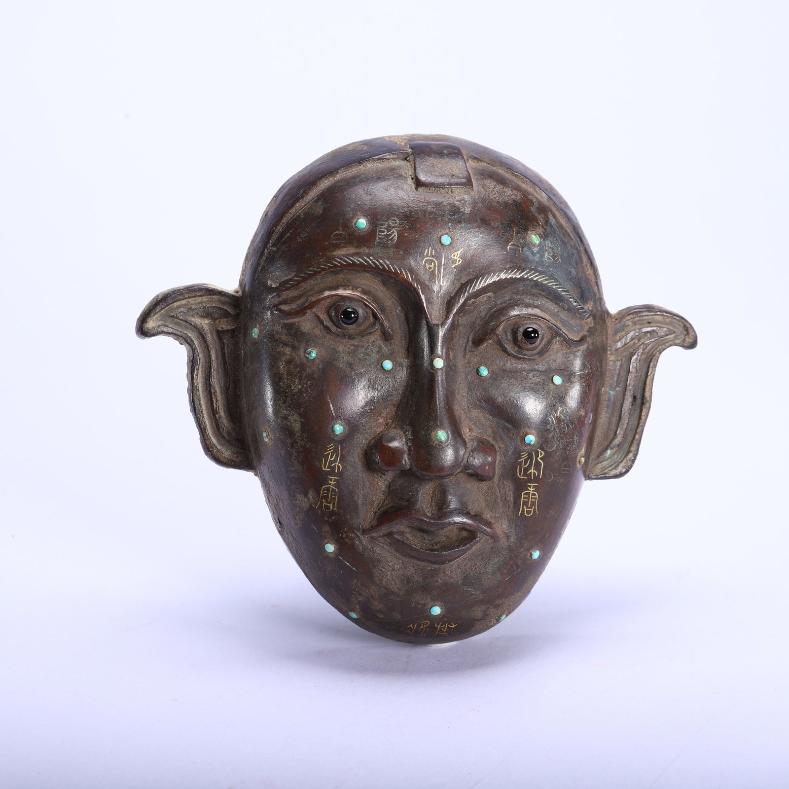 A HARDSTONES DECORATED SILVER INLAID BRONZE MASK (1 of 9)