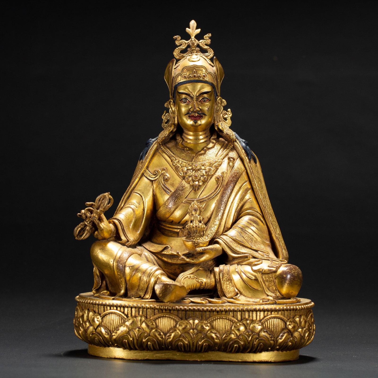 A Chinese Gilt Bronze Padmasambhava Statue: A Chinese Gilt Bronze Padmasambhava Statue (16.5 x 14 x 24cm,Weight 2800 grams)