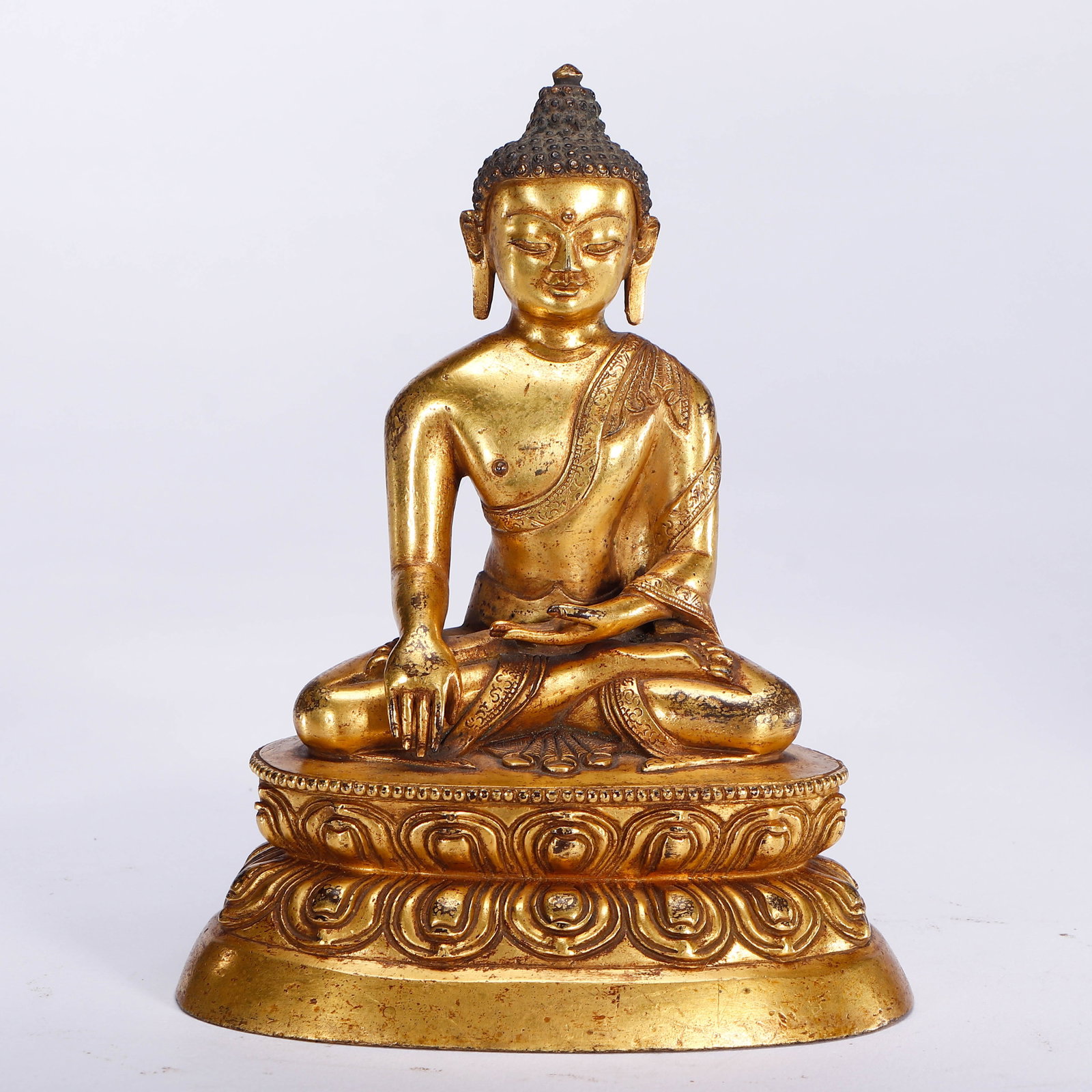 A Chinese Gilt-Bronze Buddha: A Chinese Gilt-Bronze Buddha (15cm)