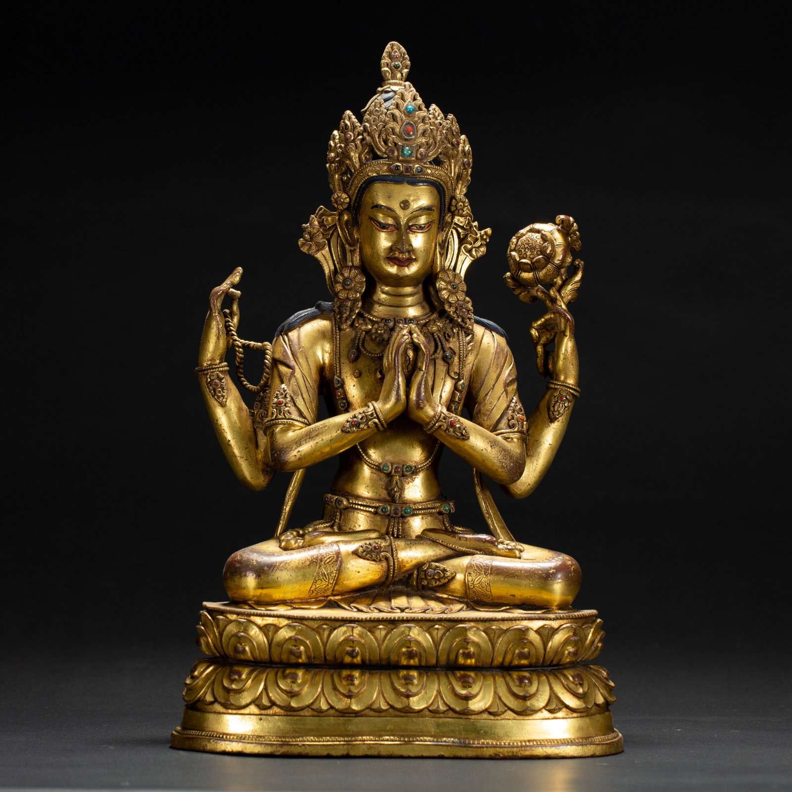 A Chinese Gilt Bronze Four-Armed Avalokiteshvara: A Chinese Gilt Bronze Four-Armed Avalokiteshvara (16.5 x 11 x 26.5cm,Weight 3130 grams)