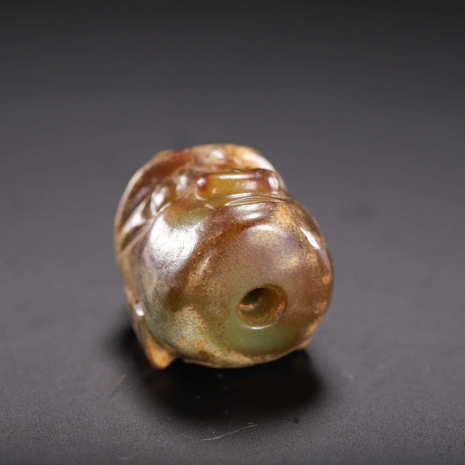 A CARVED JADE MYTHICAL BEAST HEAD - 9