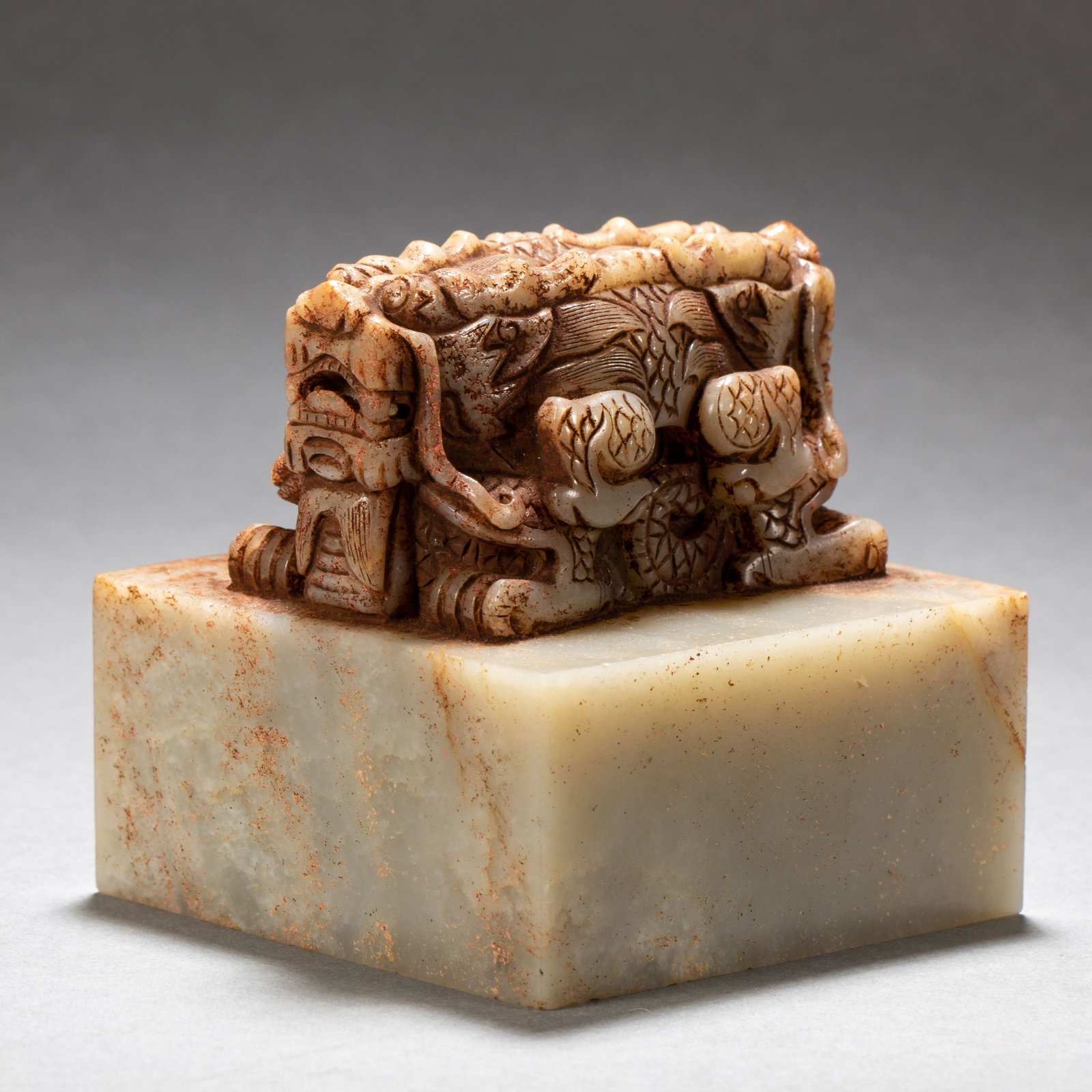 A Chinese Archaic Jade Seal: A Chinese Archaic Jade Seal (8.5 x 8.5 x 8.5cm,Weight 1150 grams)