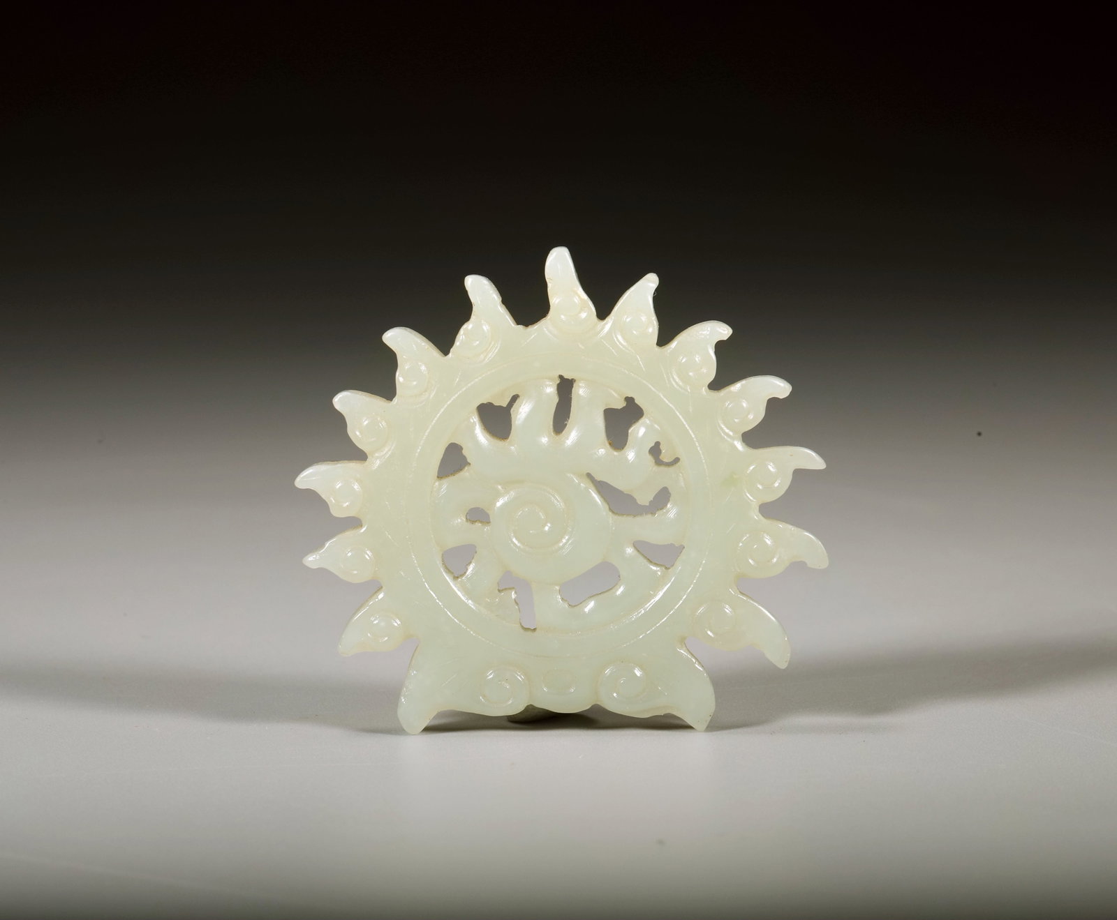 A HETIAN JADE CARVED MANI JEWEL PENDANT: A HETIAN JADE CARVED MANI JEWEL PENDANT Length:5cm,Width:4.5cm