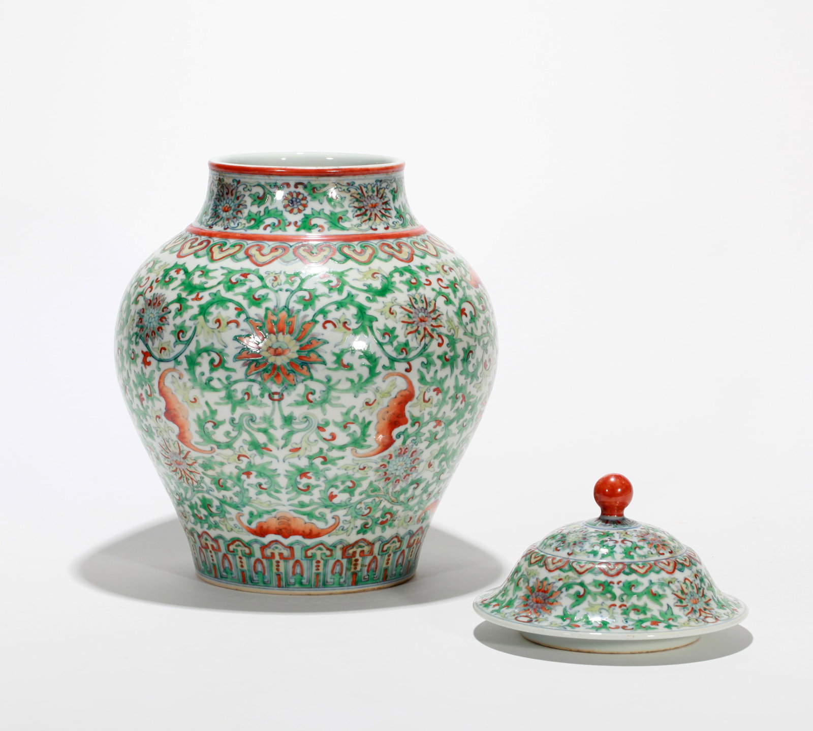 A DOUCAI FLORAL COVERED JAR - 13