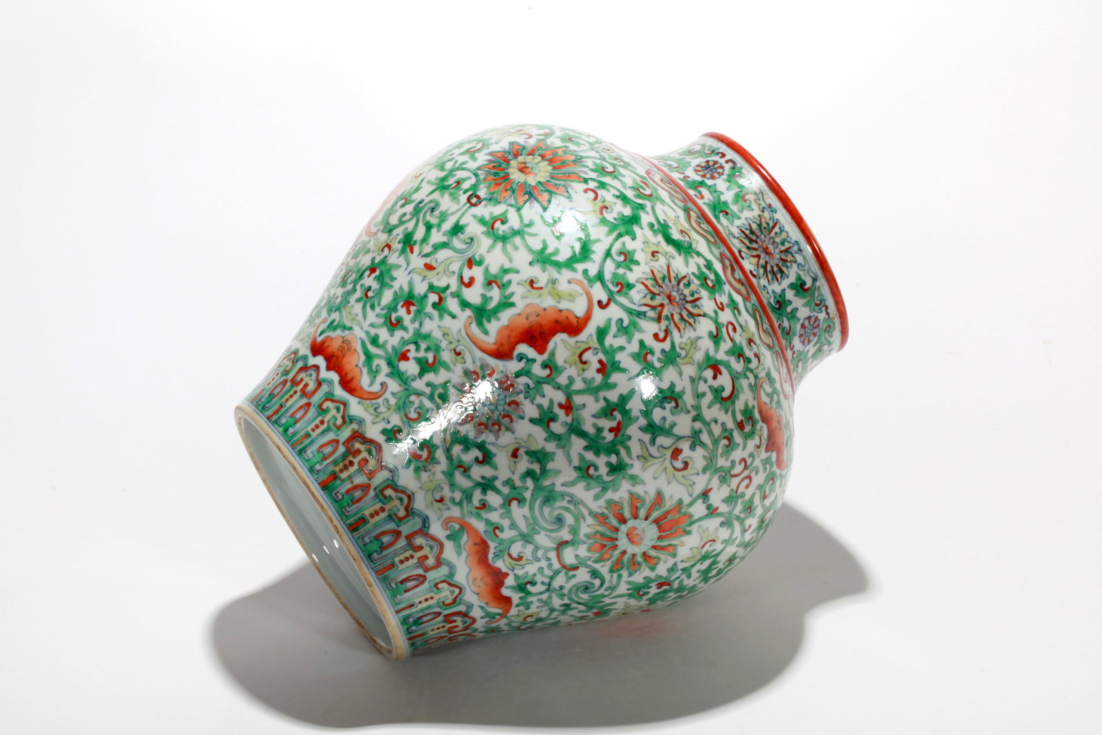 A DOUCAI FLORAL COVERED JAR - 14