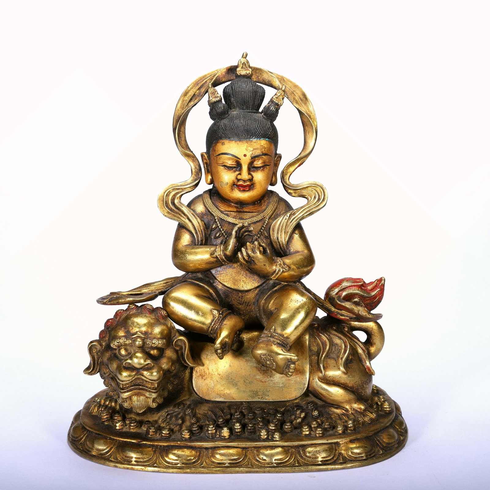 A GILT-BRONZE MANJUSHRI AS A CHILD FIGURE: A GILT-BRONZE MANJUSHRI AS A CHILD FIGURE Length:19cm,Width:13cm,Height:22cm;Weight:2200g