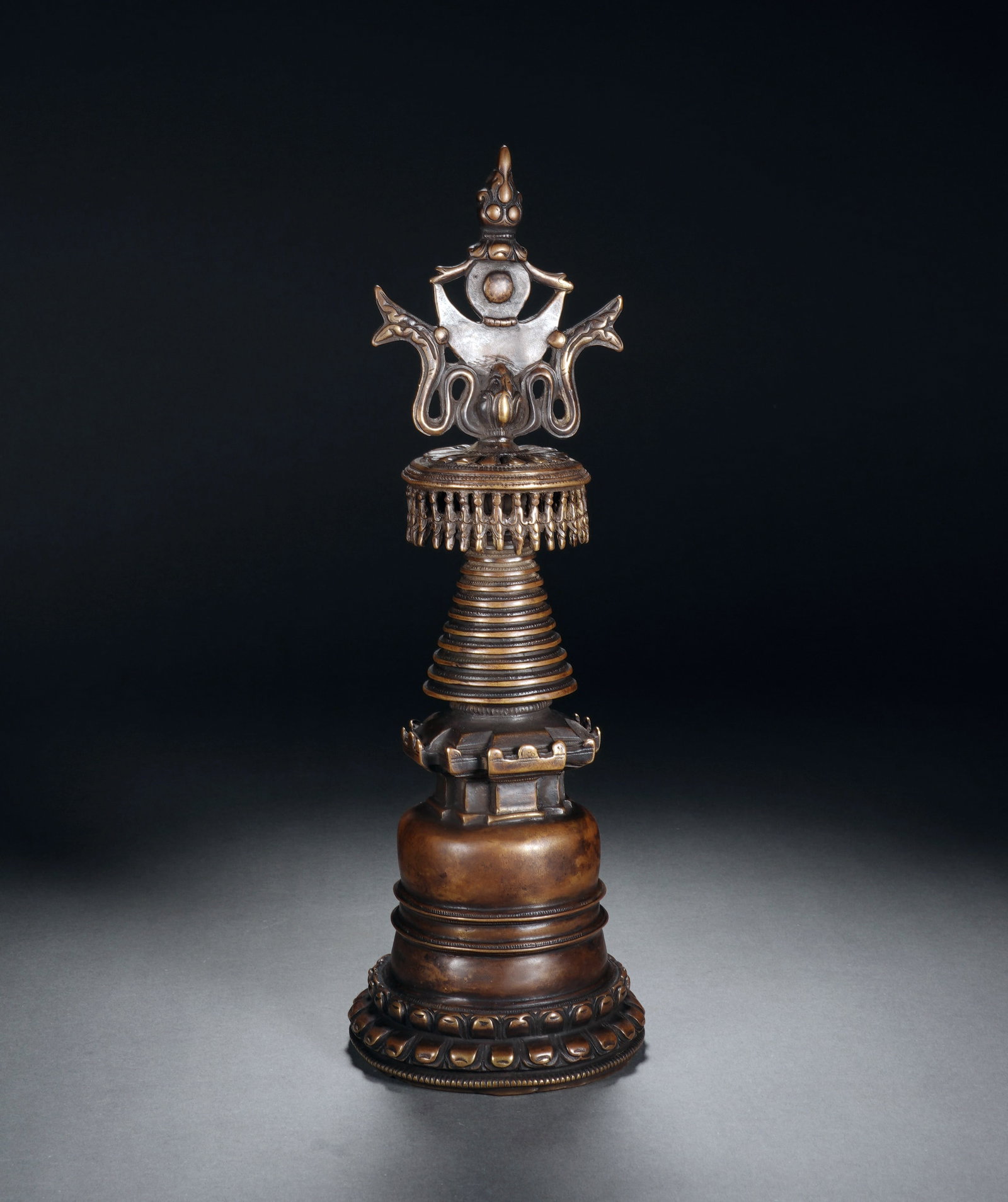 A COPPER-ALLOY KADAM STUPA - 4