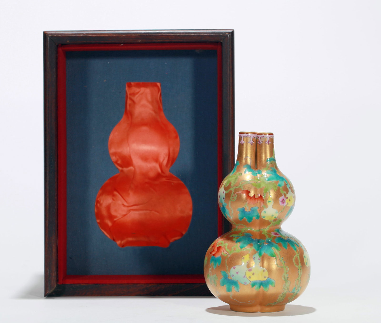 A GOLD GROUND FAMILLE ROSE THREE-GOURD VASE (WITH WOOD BOX) (1 of 9)