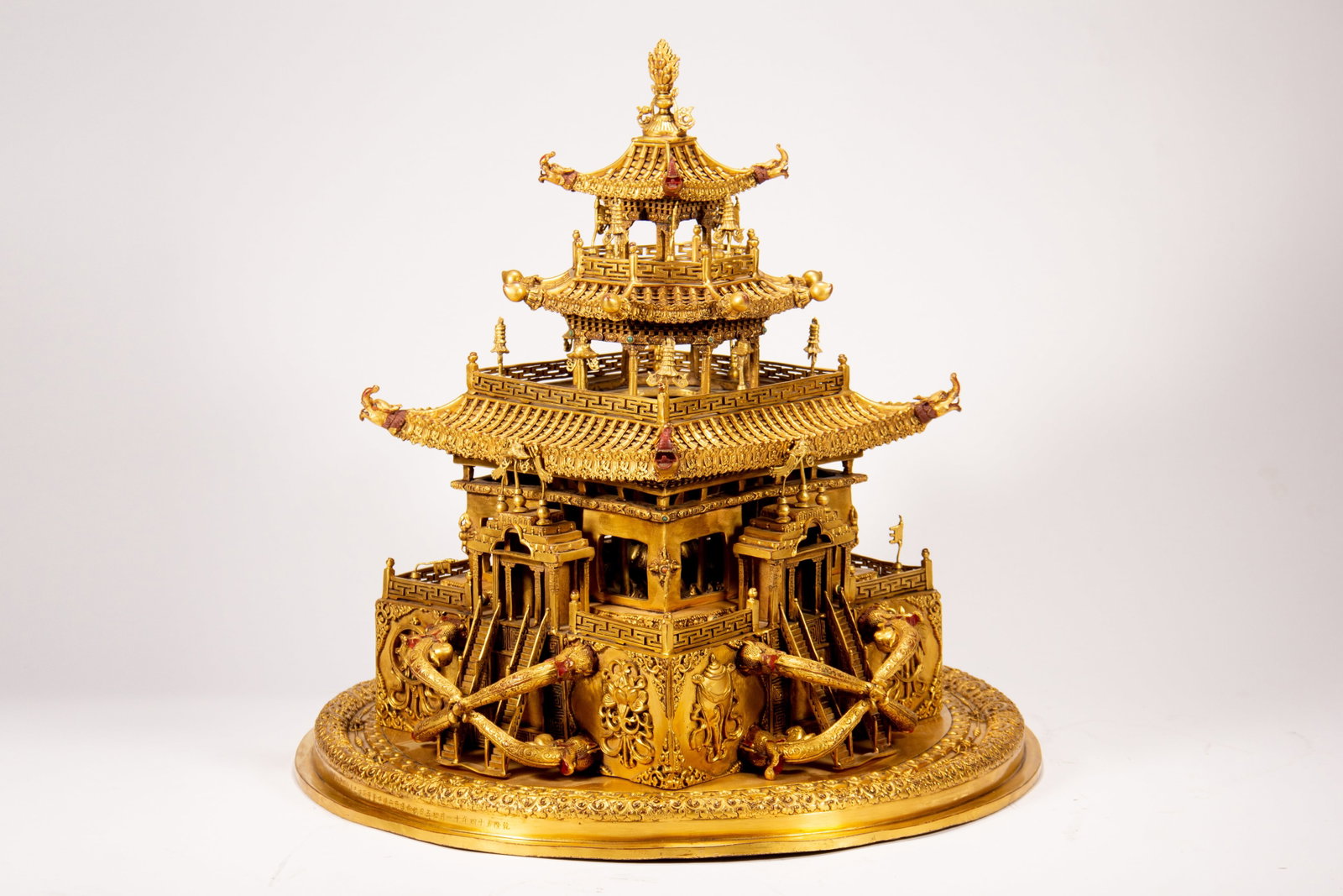 A GILT-BRONZE MANDALA - 9