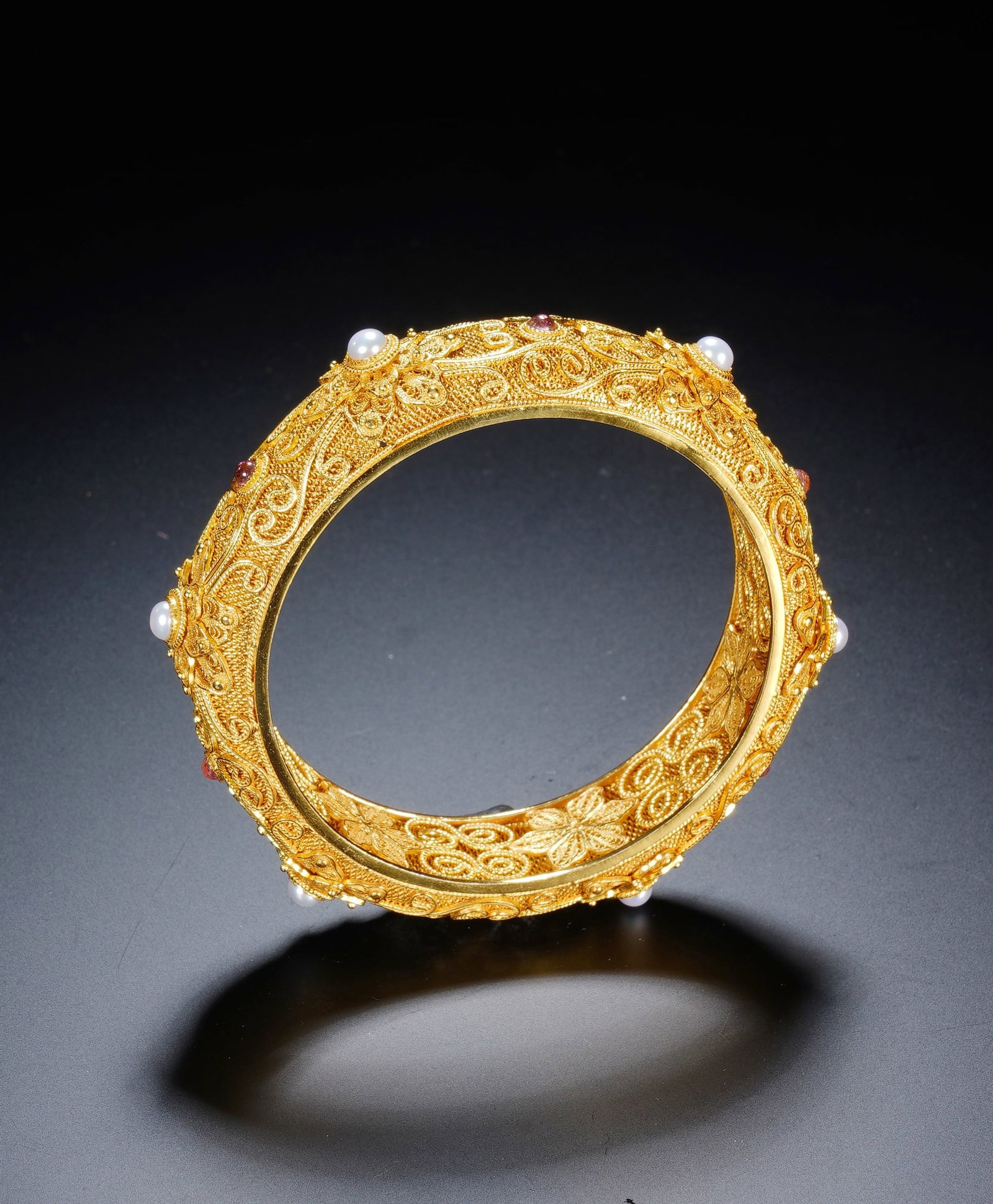 A SILVER GILT GEM-SET BANGLE - 7