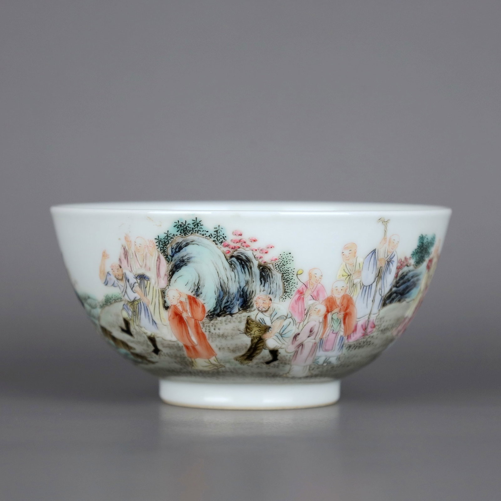 A FAMILLE ROSE BOWL WITH EIGHTEEN ARHATS: A FAMILLE ROSE BOWL WITH EIGHTEEN ARHATS Height:5.7cm,Diam:11.7cm
