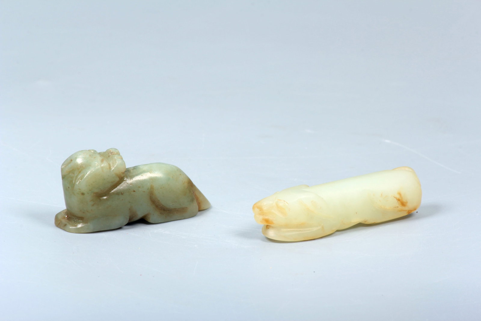 A HETIAN JADE AUSPICIOUS BEAST GROUP: A HETIAN JADE AUSPICIOUS BEAST GROUP 4.5*2.1*1.2cm,5.1*1.3*1.1cm