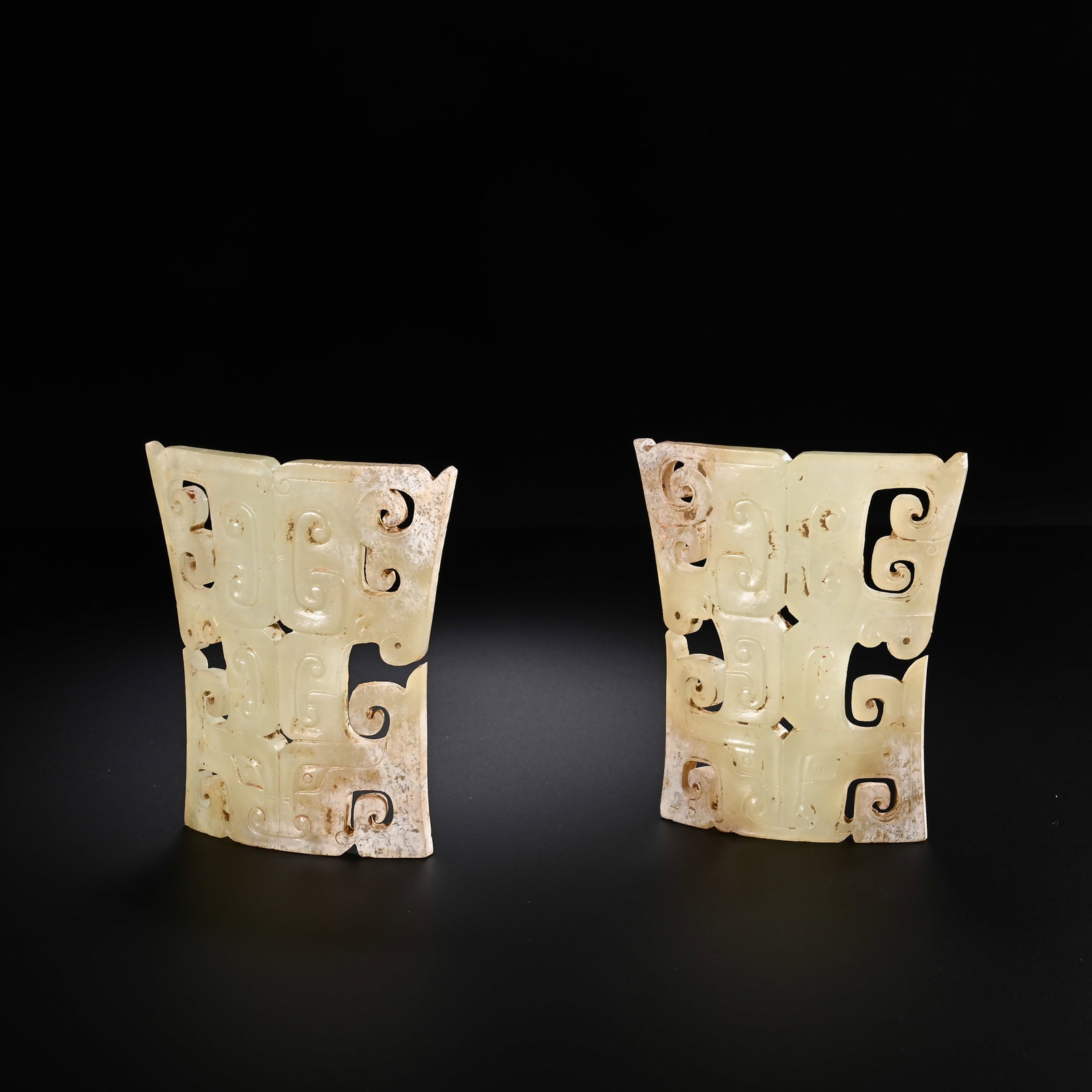 Pair of Jade Carved Cloud Pattern Bi: Pair of Jade Carved Cloud Pattern Bi (7.3 x 6.3cm)