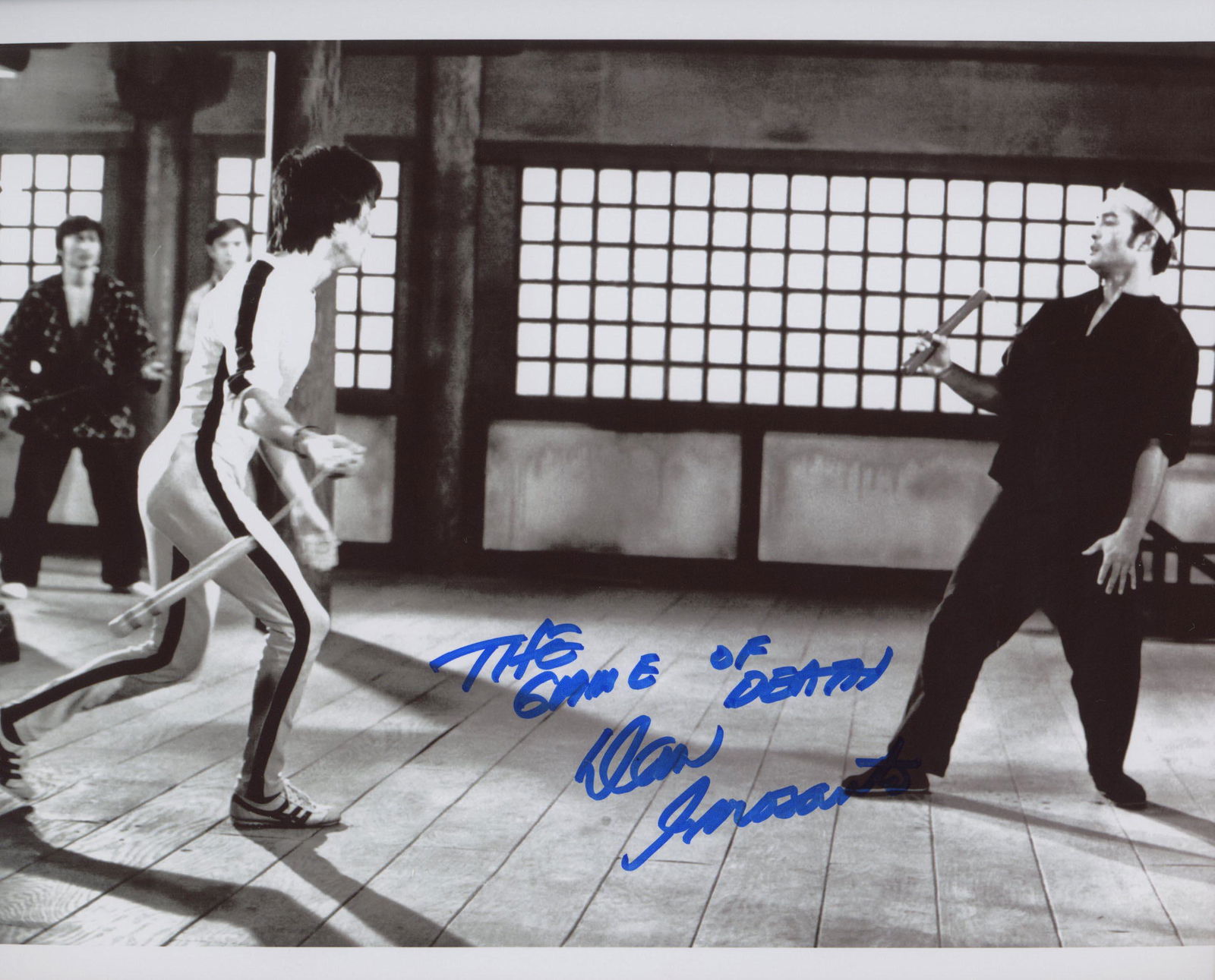 Dan Inosanto signed movie photo: Dan Inosanto signed movie photo. 8x10 inches. Classic scene between Dan and Bruce Lee
