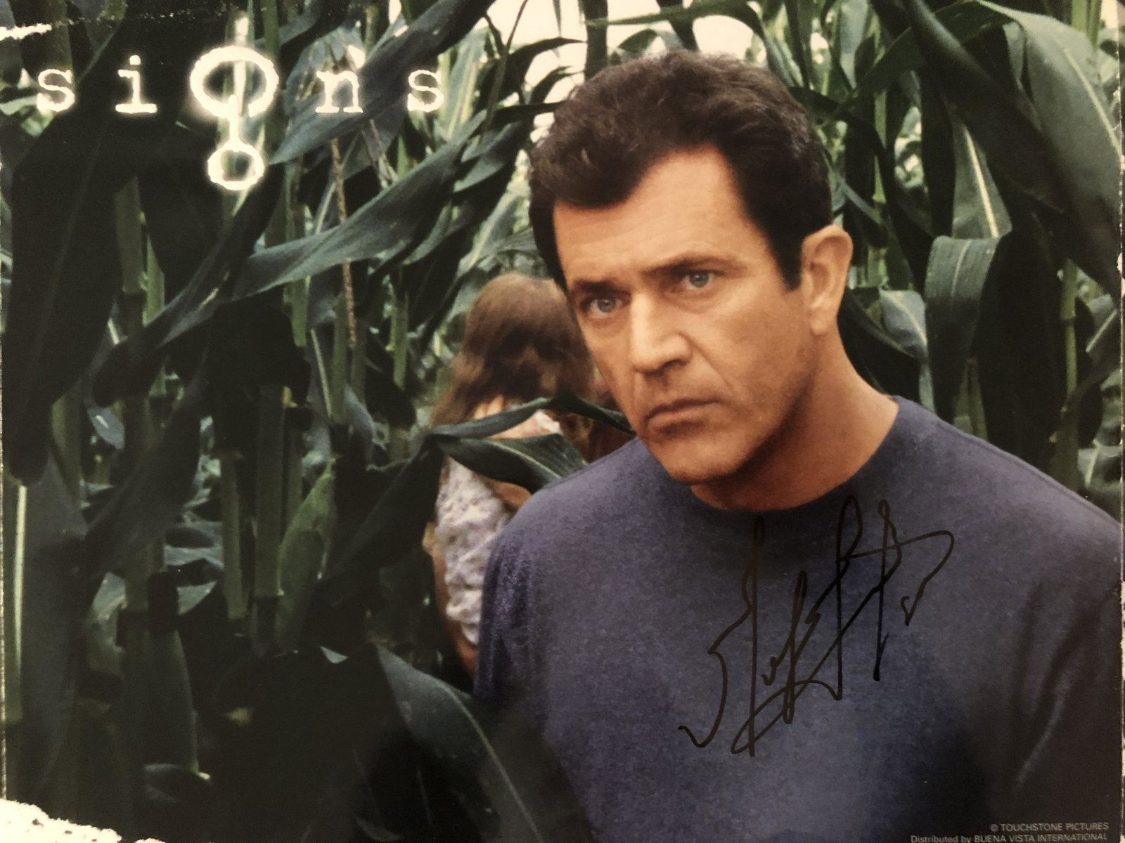Signs Mel Gibson signed movie photo: Signs signed movie photo autographed by Mel Gibson. 11x14 inches.
