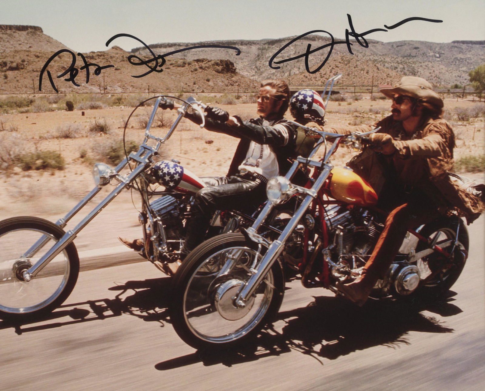 Easy Rider signed movie photo: Easy Rider signed movie photo autographed by Dennis Hopper and Peter Fonda.