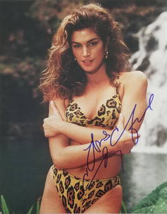 Cindy Crawford signed photo: Cindy Crawford autographed photo. 11x14 inches.â€”-This autograph is certified by a 20 year plus member of IADA (International Autograph Dealers Association) , UACC (Universal Autograph