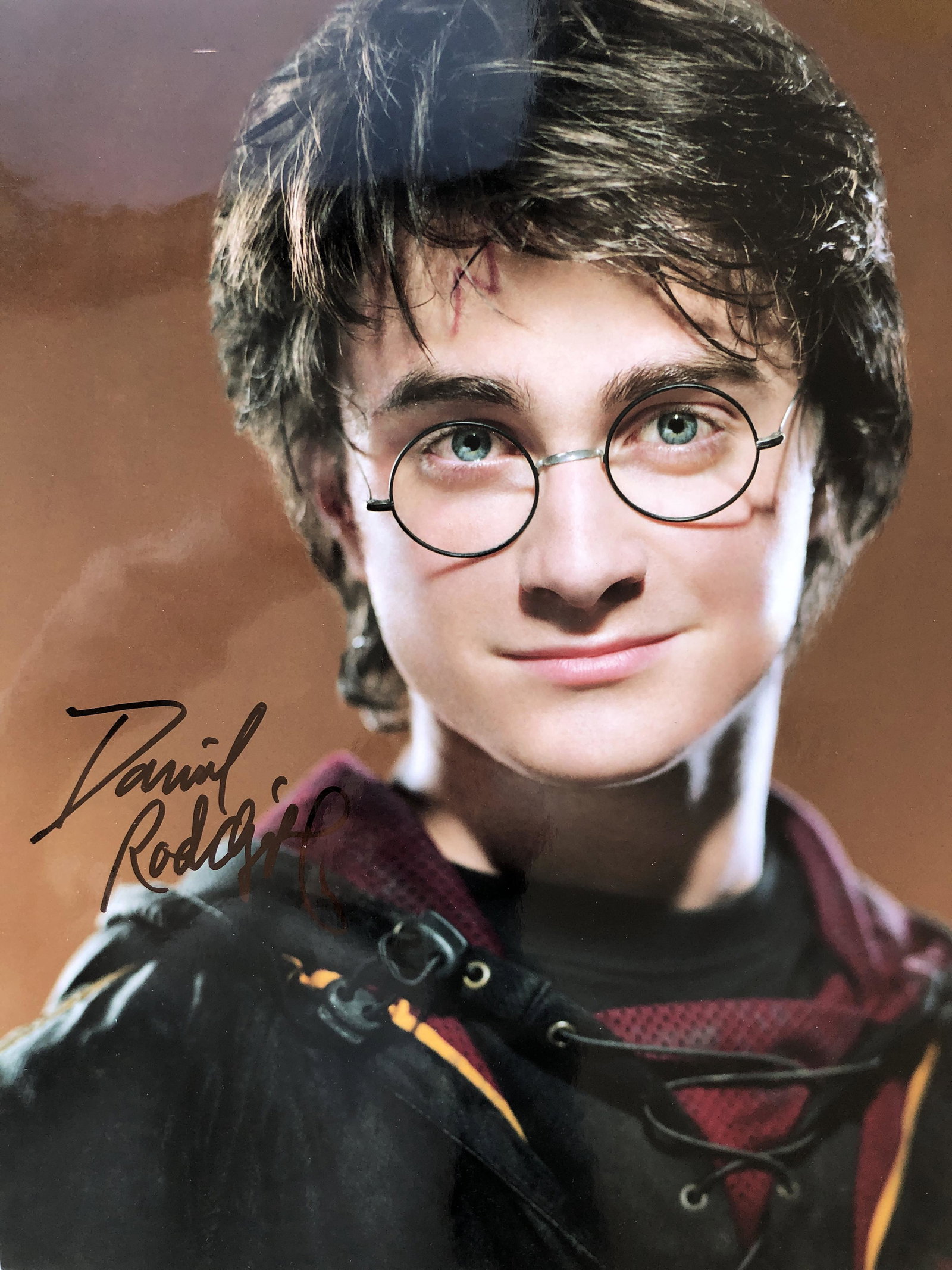 Harry Potter signed movie photo: Harry Potter signed movie photo autographed by Daniel Radcliffe. 11x14 inches
