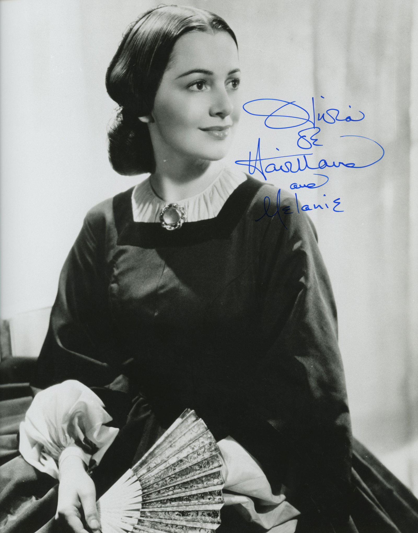 Gone With the Wind signed movie photo: Gone With the Wind signed movie photo autographed by Olivia de Havilland. 10x8 inches.