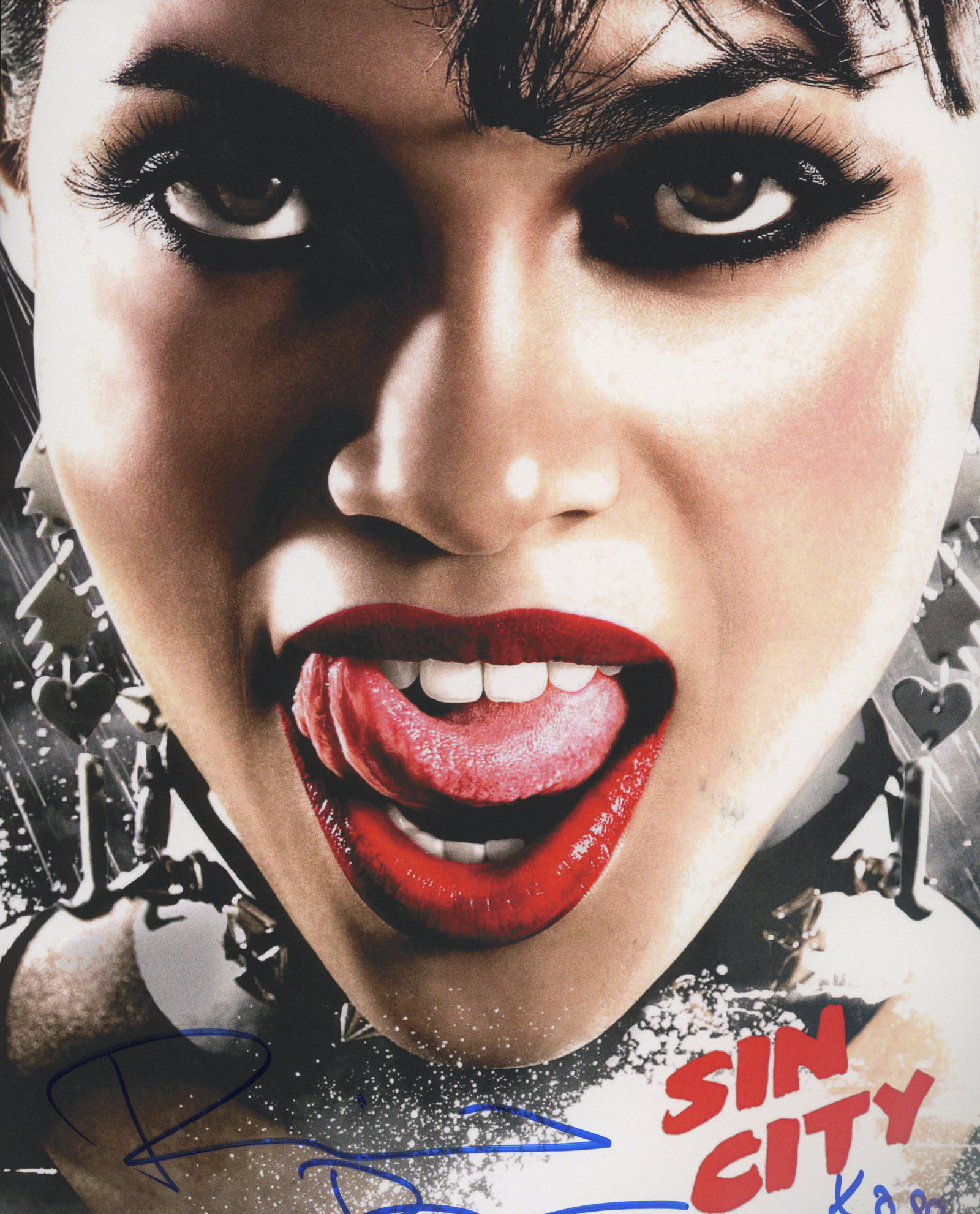 Sin City signed movie photo: Sin City signed movie photo autographed by Rosario Dawson.