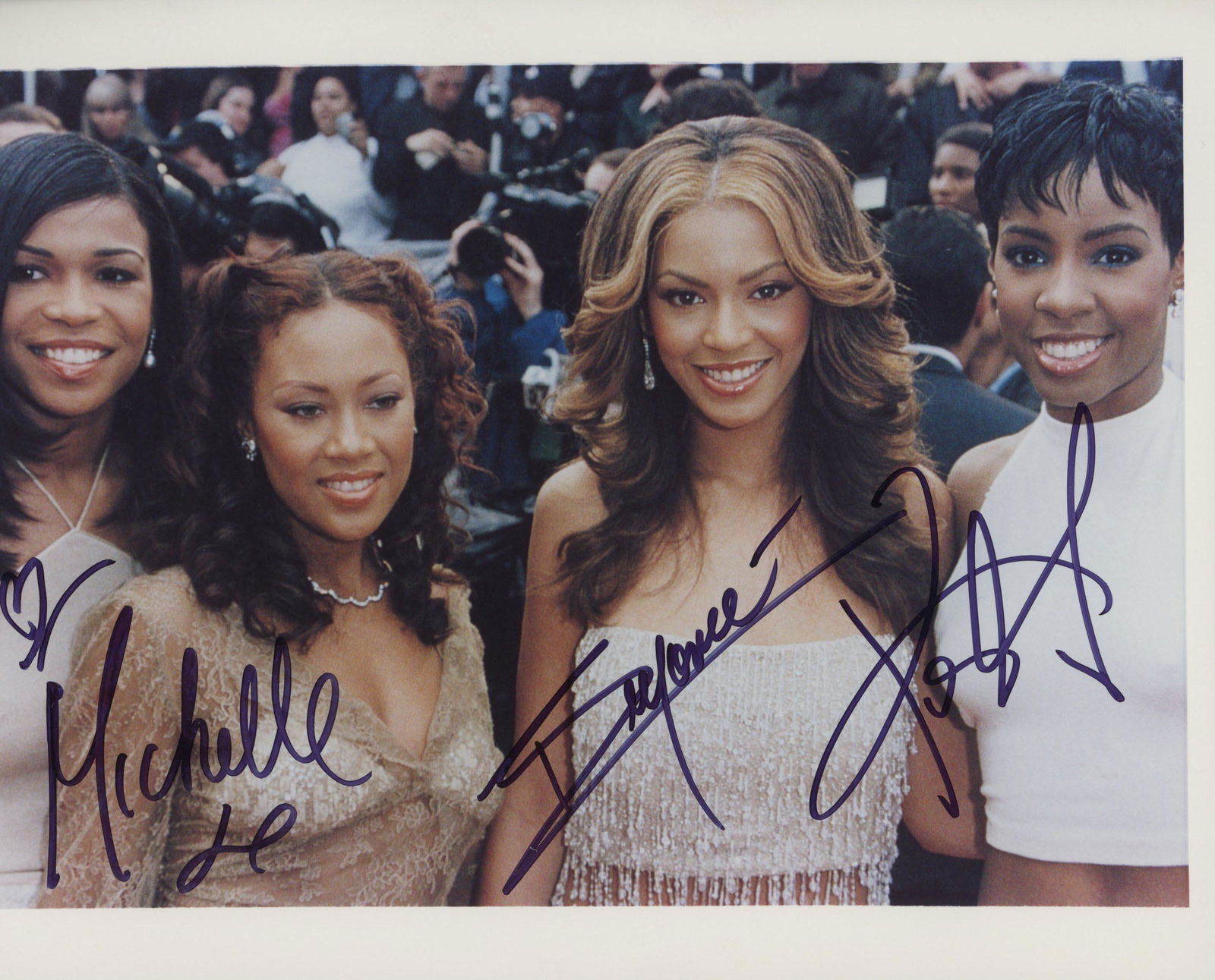Destiny's Child signed photo: Destiny's Child signed photo autographed by Michelle Williams, BeyoncÃ© Knowles and Kelly Rowland.