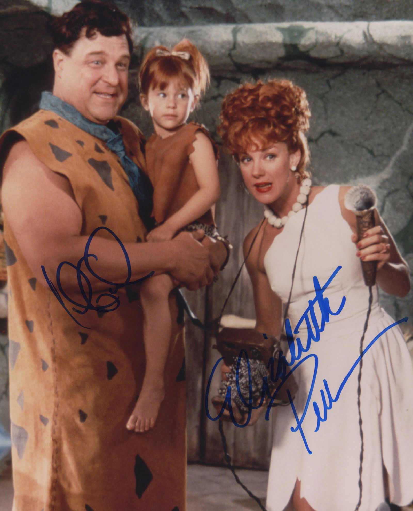 John Goodman The Flintstones signed movie photo: The Flintstones signed movie photo autographed by John Goodman and Elizabeth Perkins.