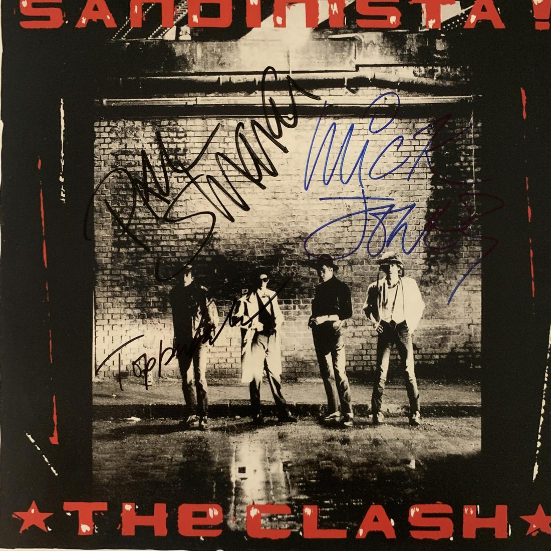 The Clash signed record: The Clash Sandinista album autographed by Paul Simonon, Topper Headon, Joe Strummer, and Mick Jones. Vinyl is included
