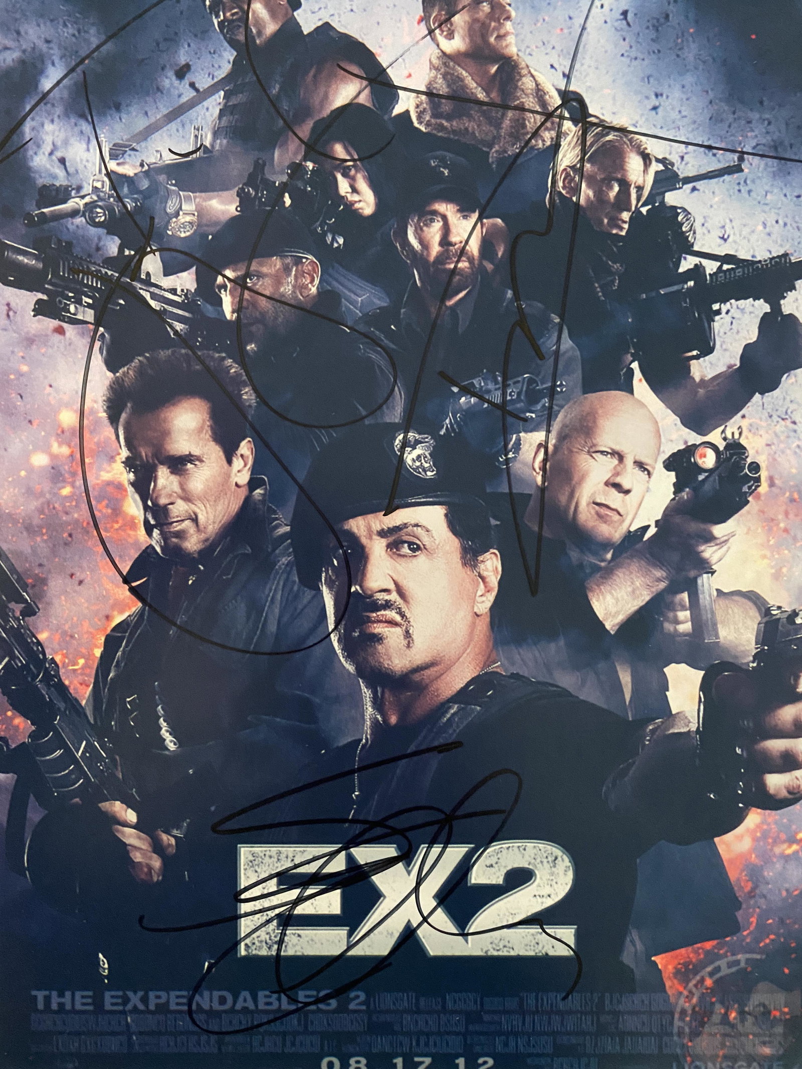 The Expendables 2 signed movie photo: The Expendables 2 signed movie photo autographed by Sylvester Stallone, Dolph Lundgren, and Jason Statham.