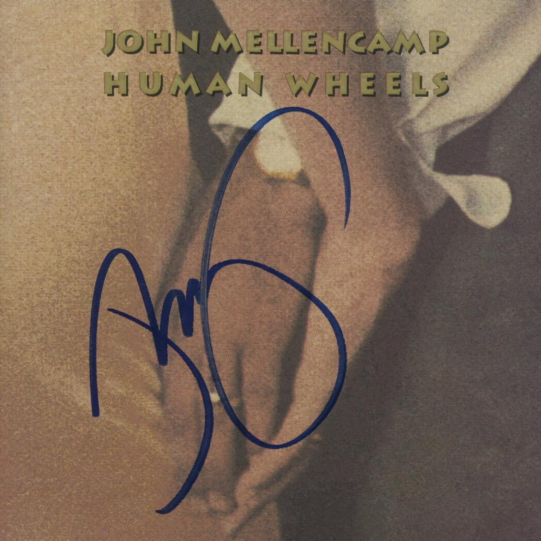 John Mellencamp signed "Human Wheels" CD cover: Human Wheels CD cover autographed by John Mellencamp.