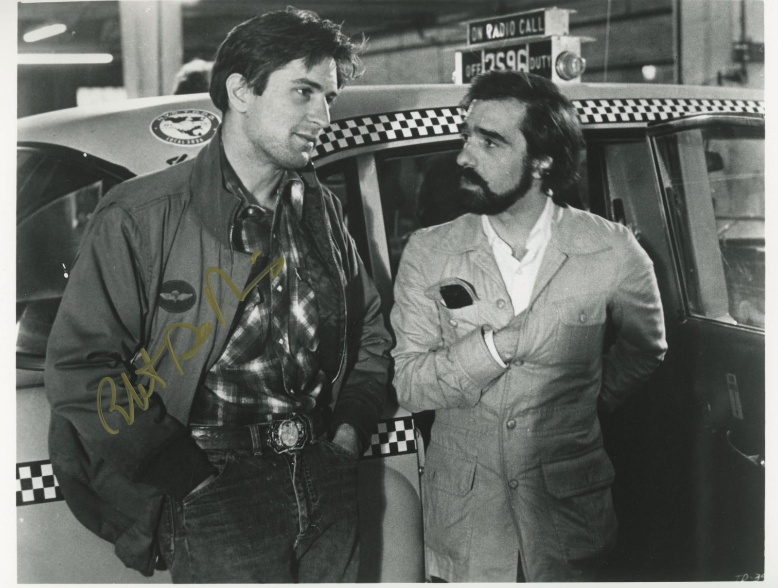 Taxi Driver signed movie photo: Taxi Driver signed movie photo autographed by Robert De Niro. 8x10 inches