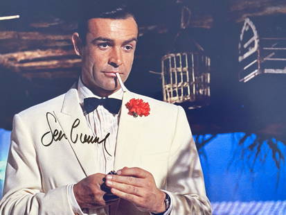 Goldfinger Sean Connery signed movie photo: Goldfinger Sean Connery signed movie photo. 8x10 inches