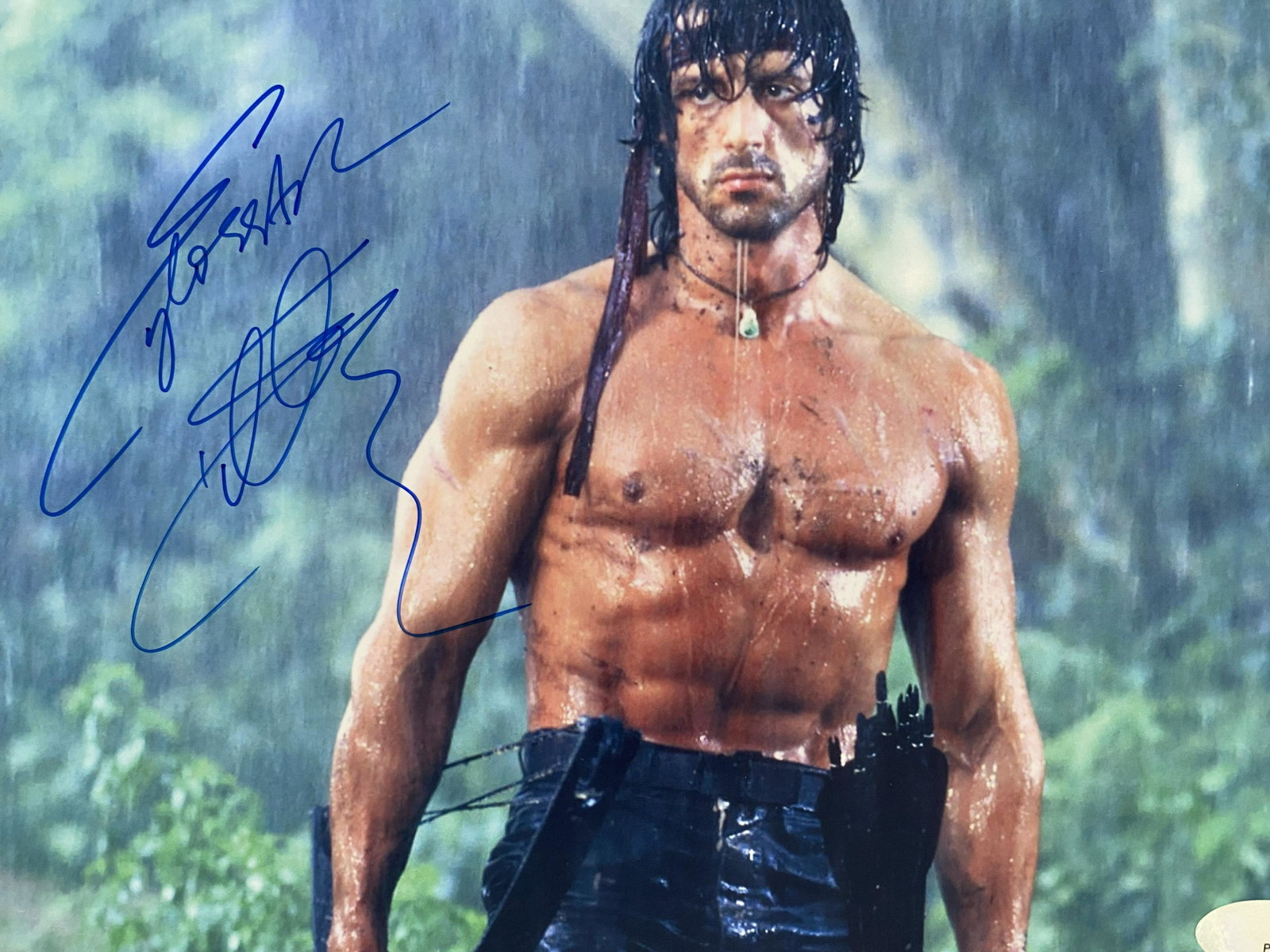 Rambo signed movie photo: Rambo signed movie photo autographed by Sylvester Stallone. 8x10 inches