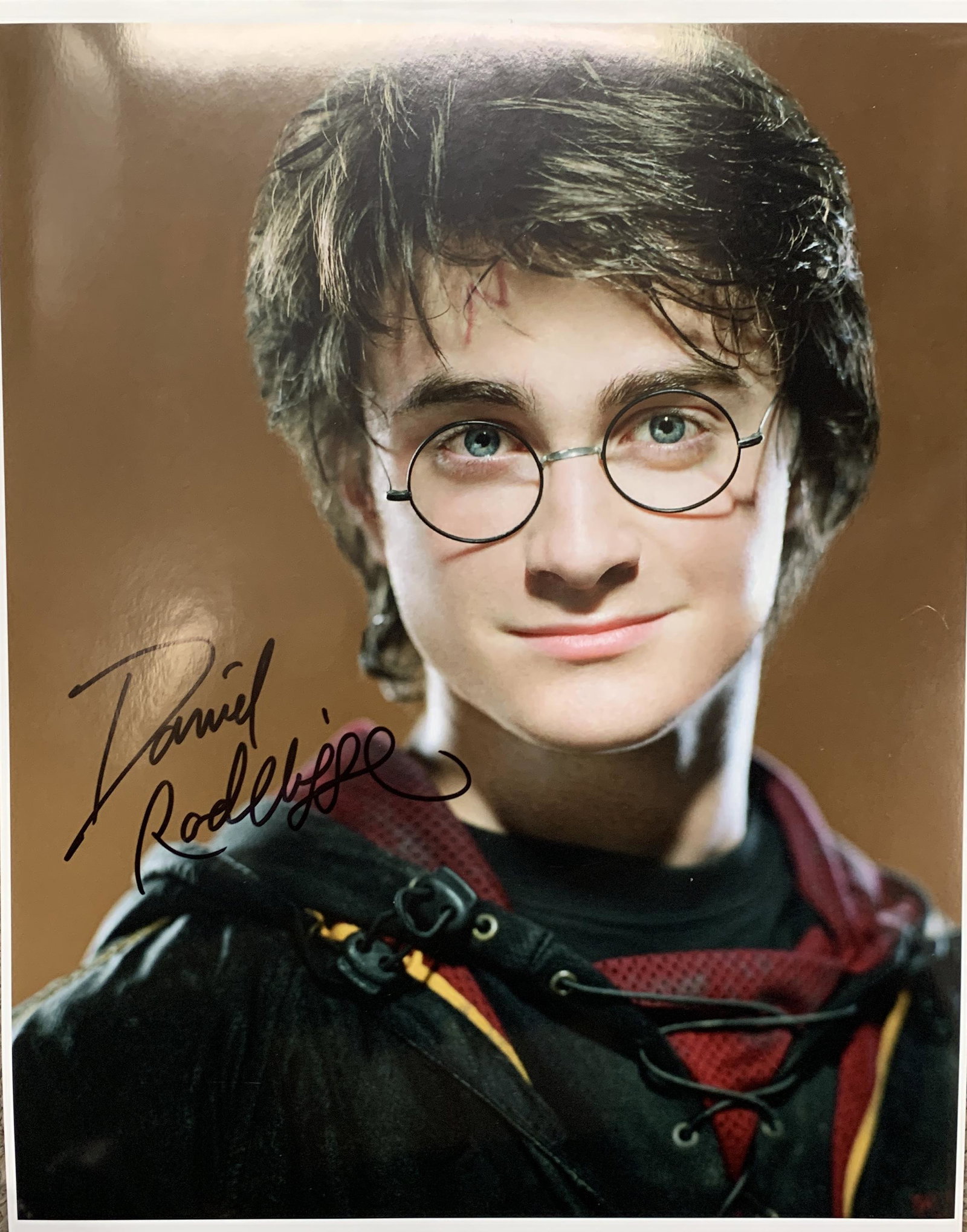 Daniel Radcliffe signed Harry Potter photo: Daniel Radcliffe Harry Potter autographed photo. 11x14 inches.