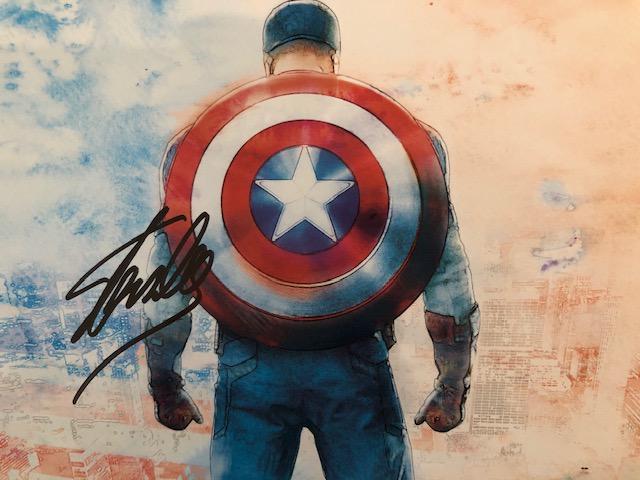 Stan Lee signed Captain America postcard: Captain America The Winter Soldier Marvel postcard signed by Stan Lee. 5.5x7 inches