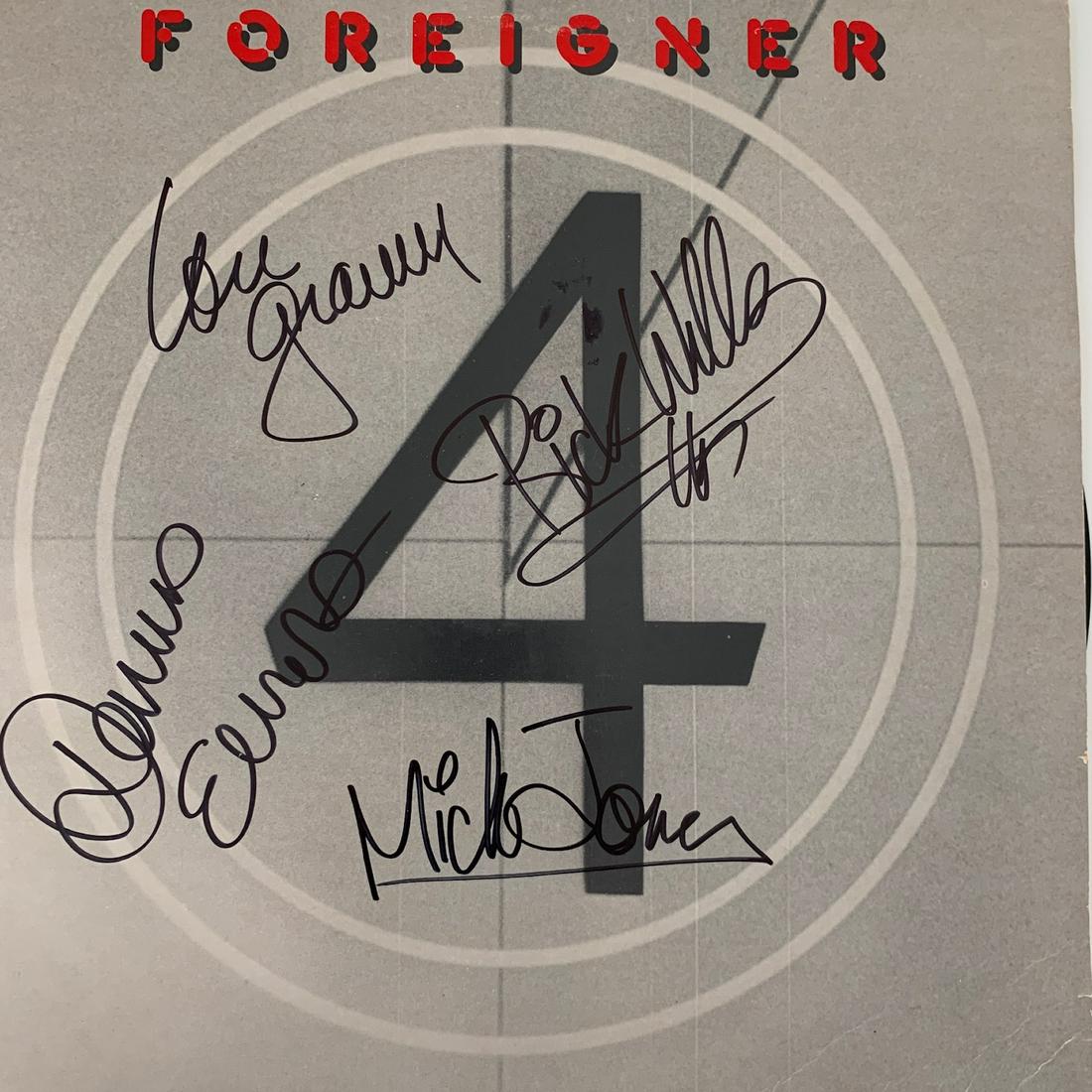 Foreigner signed record: Foreigner 4 album signed by Mick Jones, Lou Gramm, Dennis Elliot, and Rick Wills. This album includes vinyl