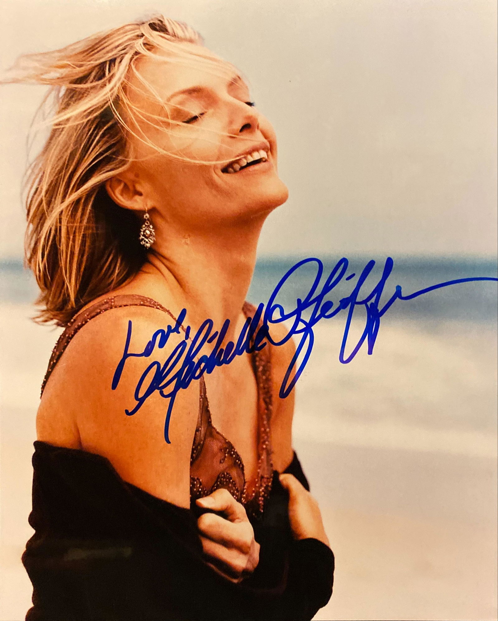Michelle Pfeiffer signed photo: Michelle Pfeiffer signed 8x10 photo.
