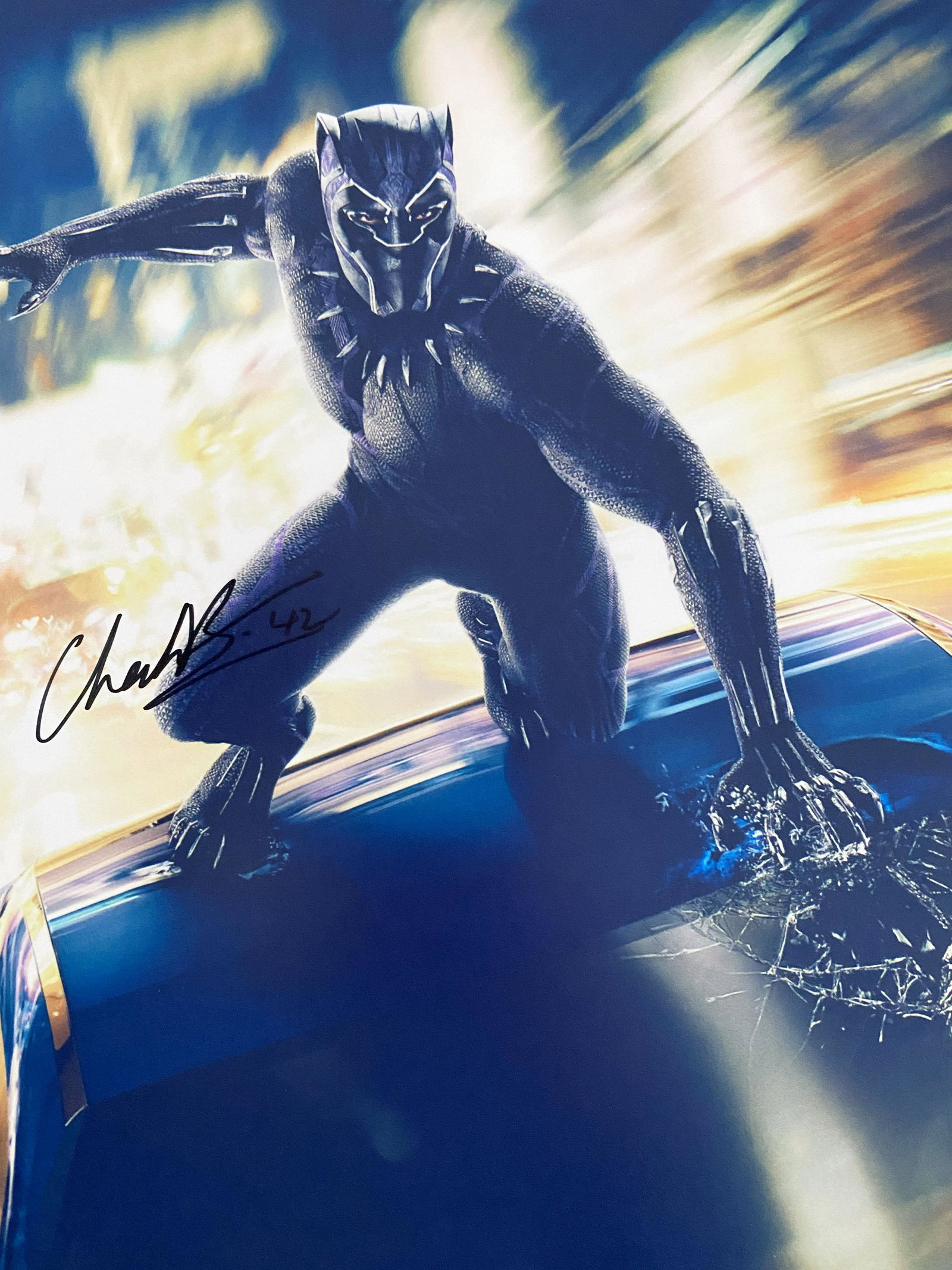 Black Panther Chadwick Boseman signed movie photo: Black Panther signed photo autographed by Chadwick Boseman. 8x10 inches