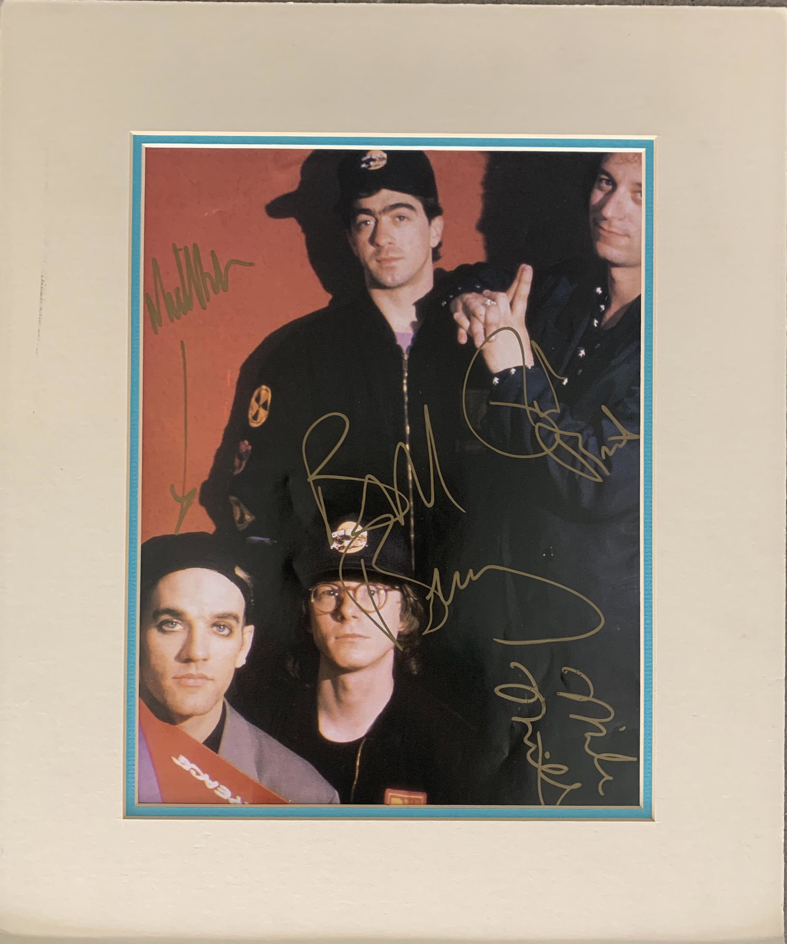 R.E.M. signed photo: R.E.M. signed photo autographed by Michael Stipe, Mike Mills, Bill Berry and Peter Holsapple. 11x14 inches