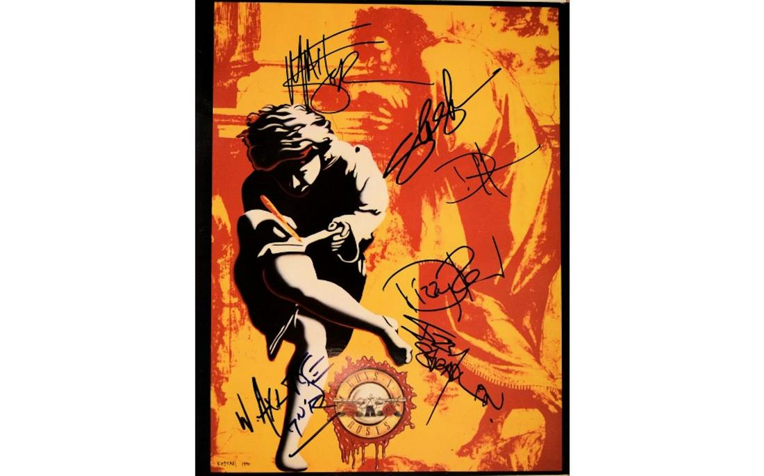 Guns N' Roses signed Use Your Illusion tour book: Guns N' Roses signed Use Your Illusion 1991 Tour Book autographed by Izzy Stradlin, W. Axl Rose, Duff McKagan, Slash, Matt Sorum & Ddizzy Reed