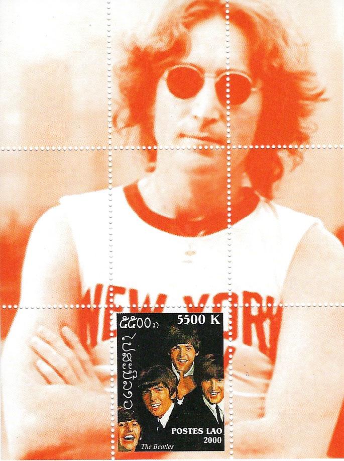 The Beatles postage stamp: Postage stamp printed in Laos showing The Beatles; circa 2000
