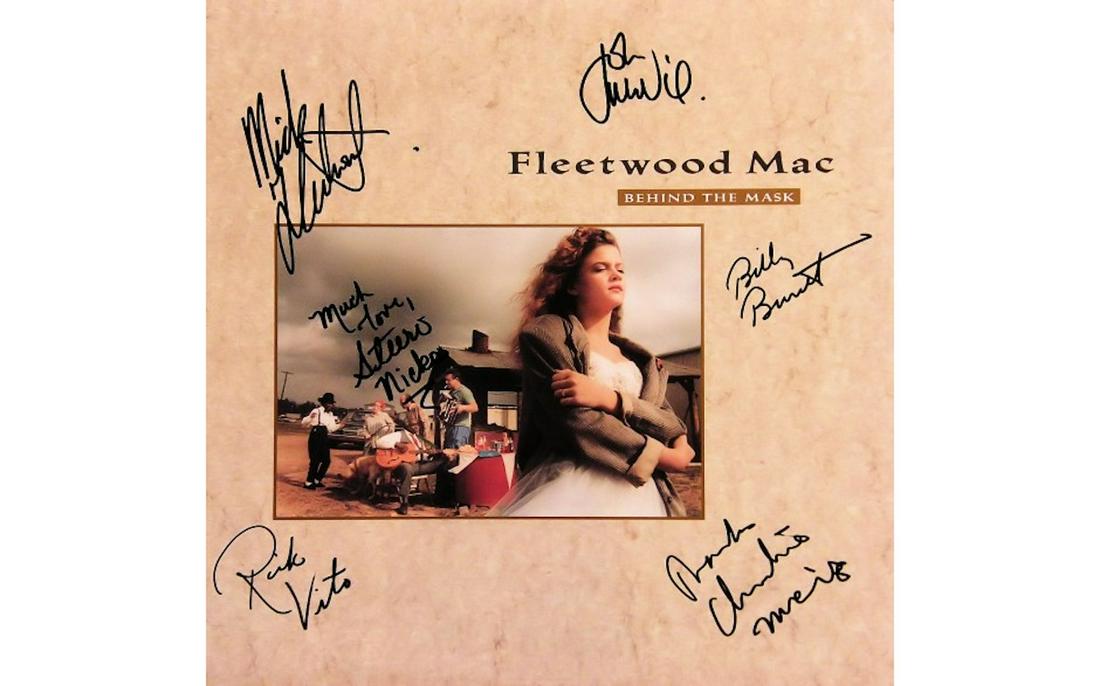 Fleetwood Mac Behind the Mask signed album: Fleetwood Mac Behind the Mask 1990 signed album autographed by Stevie Nicks, Mick Fleetwood, John and Christine McVie. Rick Vito and Billy Burnett