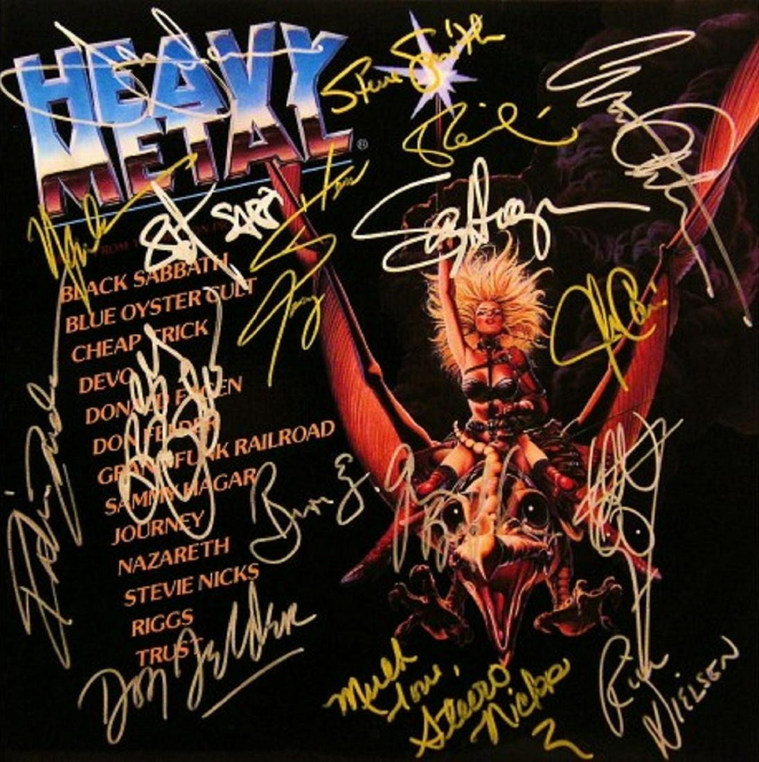 Heavy Metal the movie album: Music from the 1981 motion picture "Heavy Metal" album autographed by Steve Perry, Jonathan Cain, Neal Schon, Ross Valory, Steve Smith, Sammy Hagar, Rick Nielsen, Bun E. Carlos, Robin Zander, Don Feld
