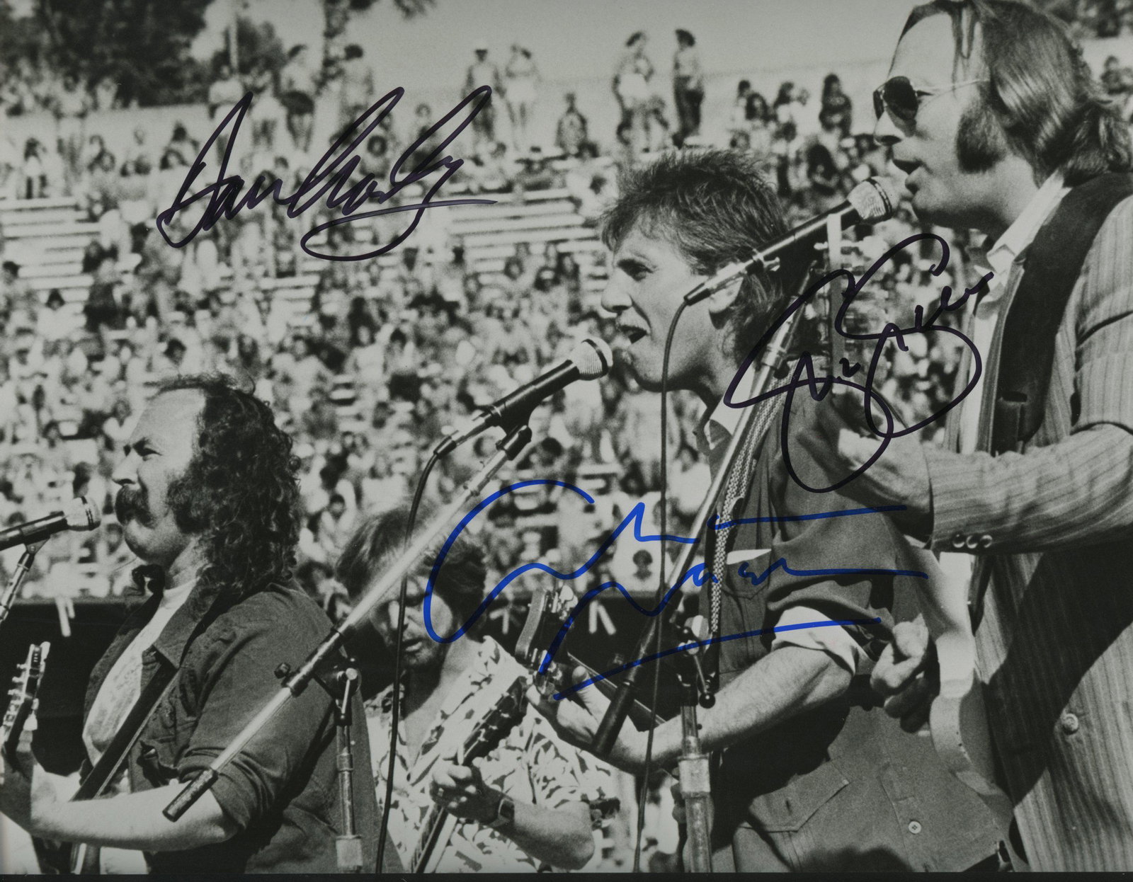 Crosby, Stills & Nash signed photo: Crosby, Stills & Nash signed photo autographed by David Crosby, Graham Nash and Stephen Stills. 8x10 inches