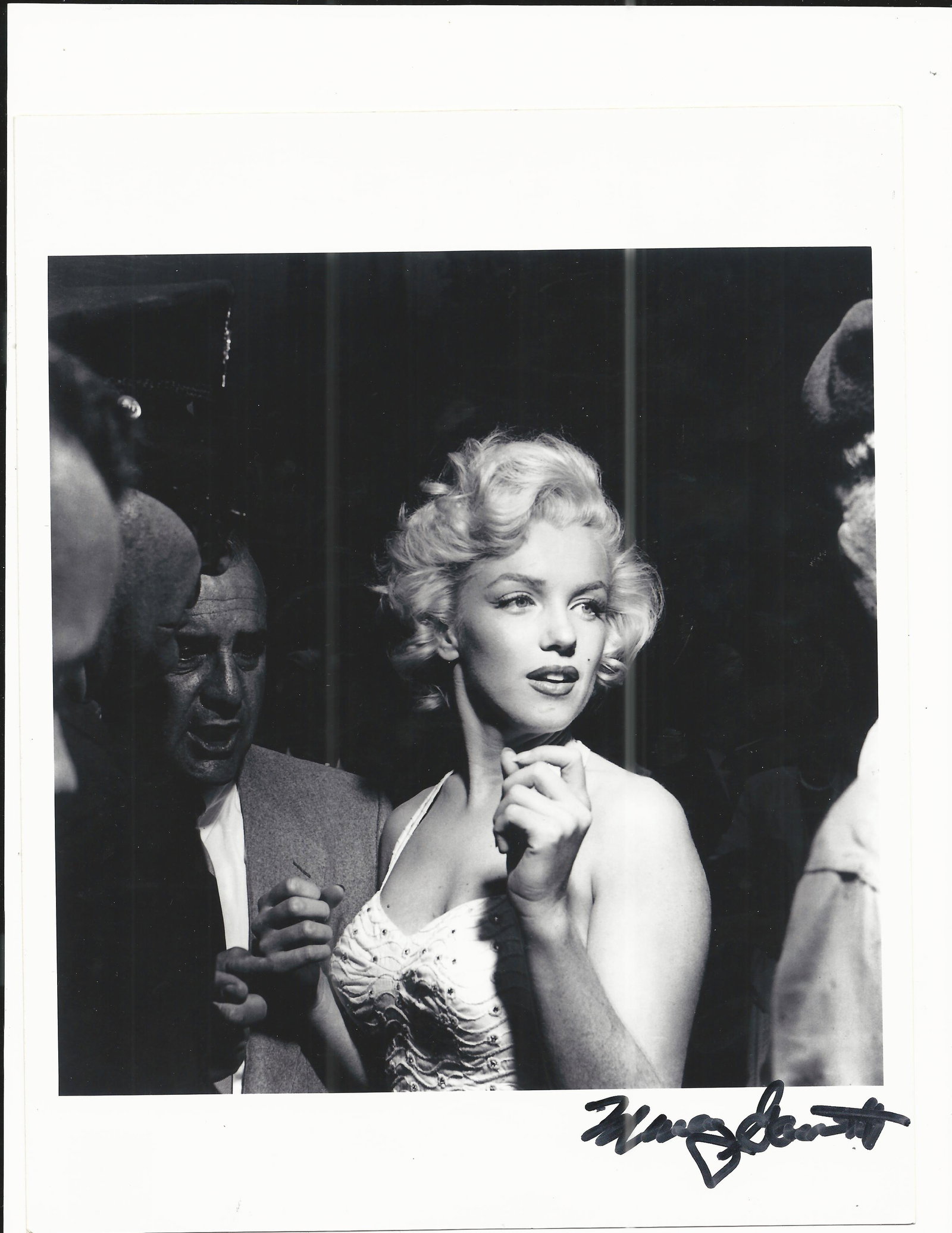Marilyn Monroe photographer signed photo: Marilyn Monroe signed photo autographed by photographer Murray Garrett. 8x10 inches