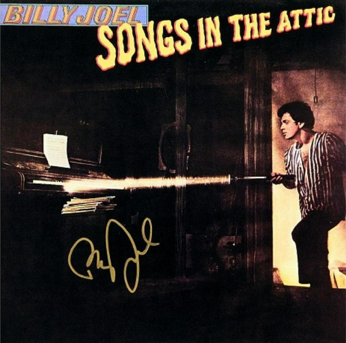 Billy Joel signed "Songs In the Attic" album: Billy Joel's 1981 hit album "Songs In the Attic" autographed by Billy Joel.